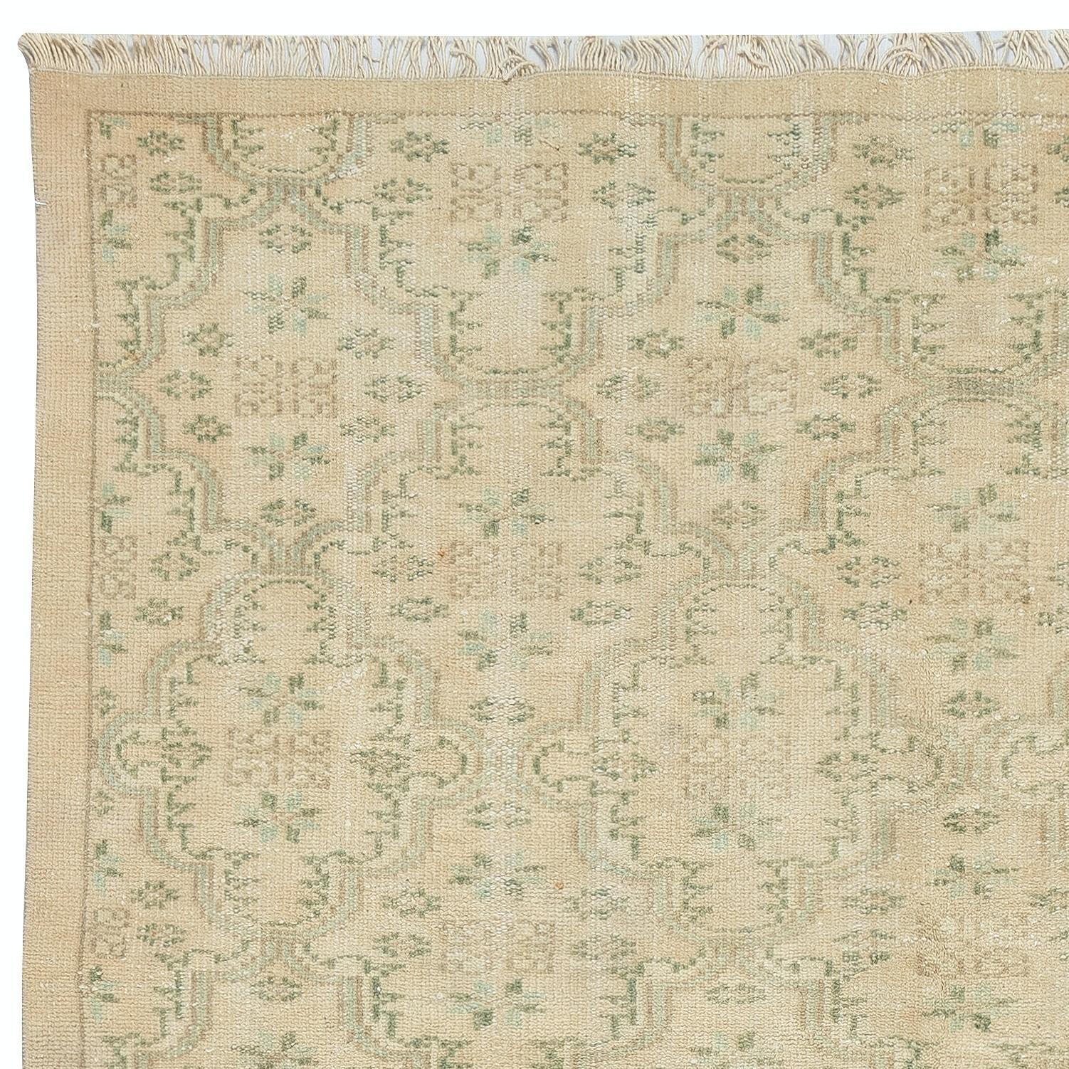 Hand-Knotted 5.7x9 Ft Vintage Sun Faded Rug with Floral Design. Handmade Turkish Carpet For Sale