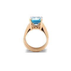 5.8 Carat Emerald Cut Blue Topaz Yellow Gold Triple Band Ring