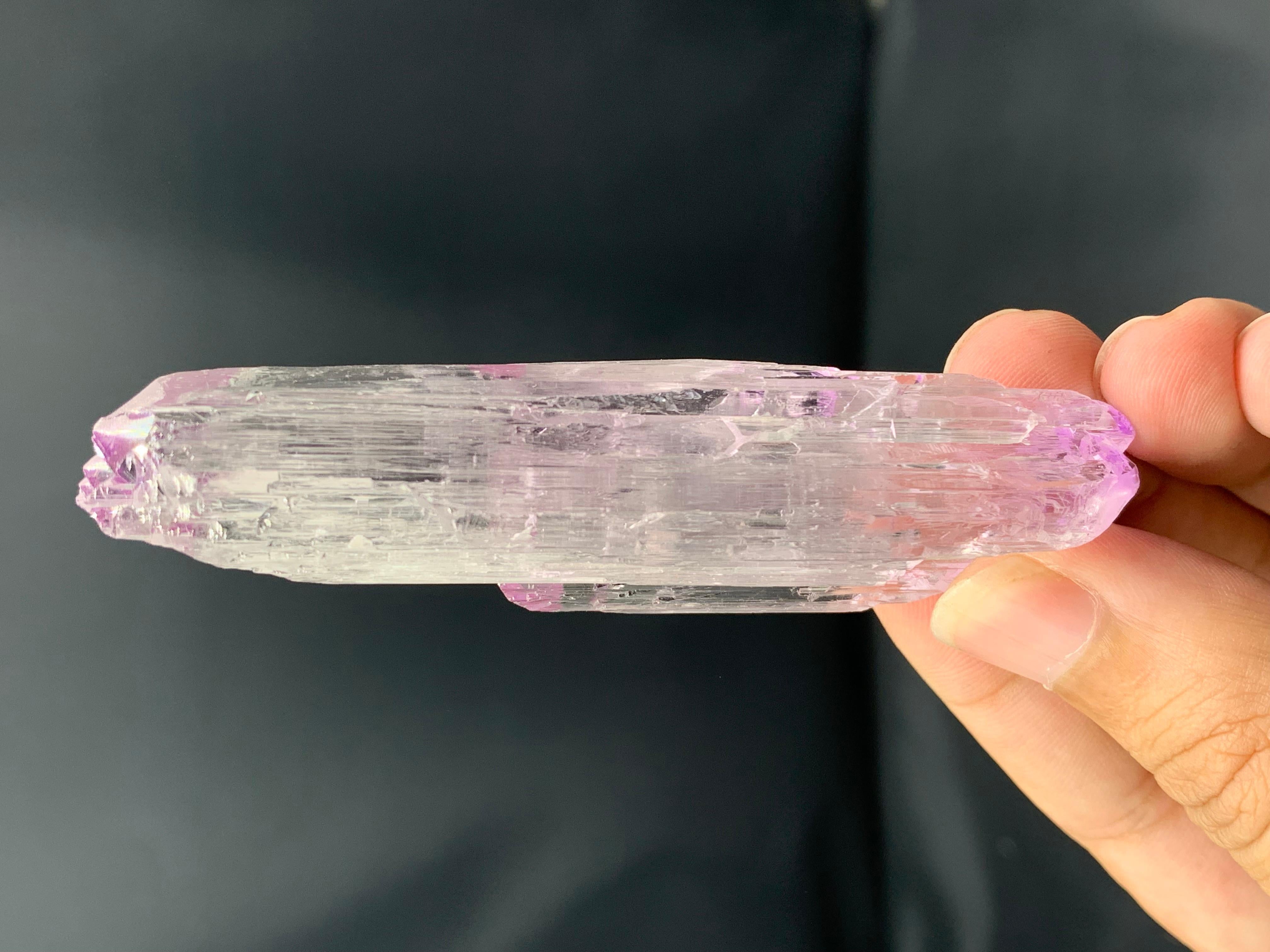 PRODUCT INFORMATION:

Specimen Name: Kunzite crystal

Weight: 58 grams

Dimensions: H: 8.8 x W: 2.4 x D: 2 cm

Treatment: None

Locality: Darrah I Pech District, Kunnar Province,
Afghanistan

DESCRIPTION:

Kunzite is a purplish-pink color variety of