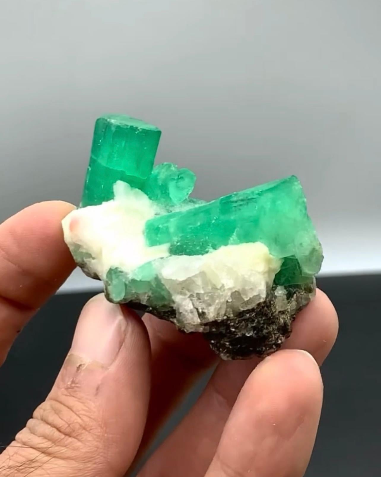 Product Information:

Specimen Type: Emerald Crystals on Calcite

Weight: 58 grams

Dimension: H: 3.3 x W: 5.7 x D: 3.3 cm 

Origin: Chitral Valley, KPK Province, Pakistan

Treatment: None

Description:

This exquisite specimen features a striking,