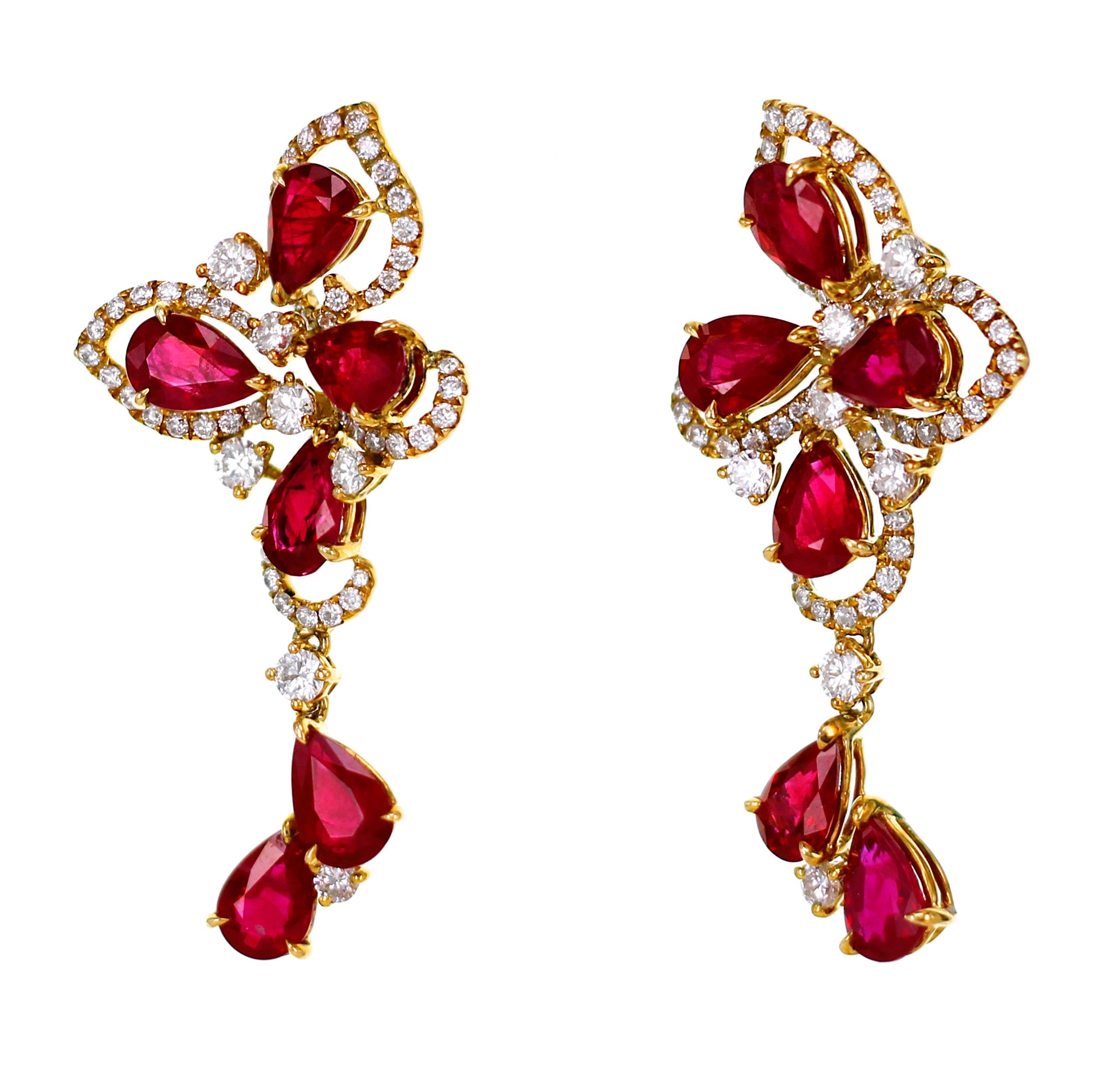 5.80 carat of ruby is studded with 1.07 carat of white brilliant diamond in this beautiful cocktail earring. The dangle earring is specially made in yellow gold to give a subtle contrast with the rubies.