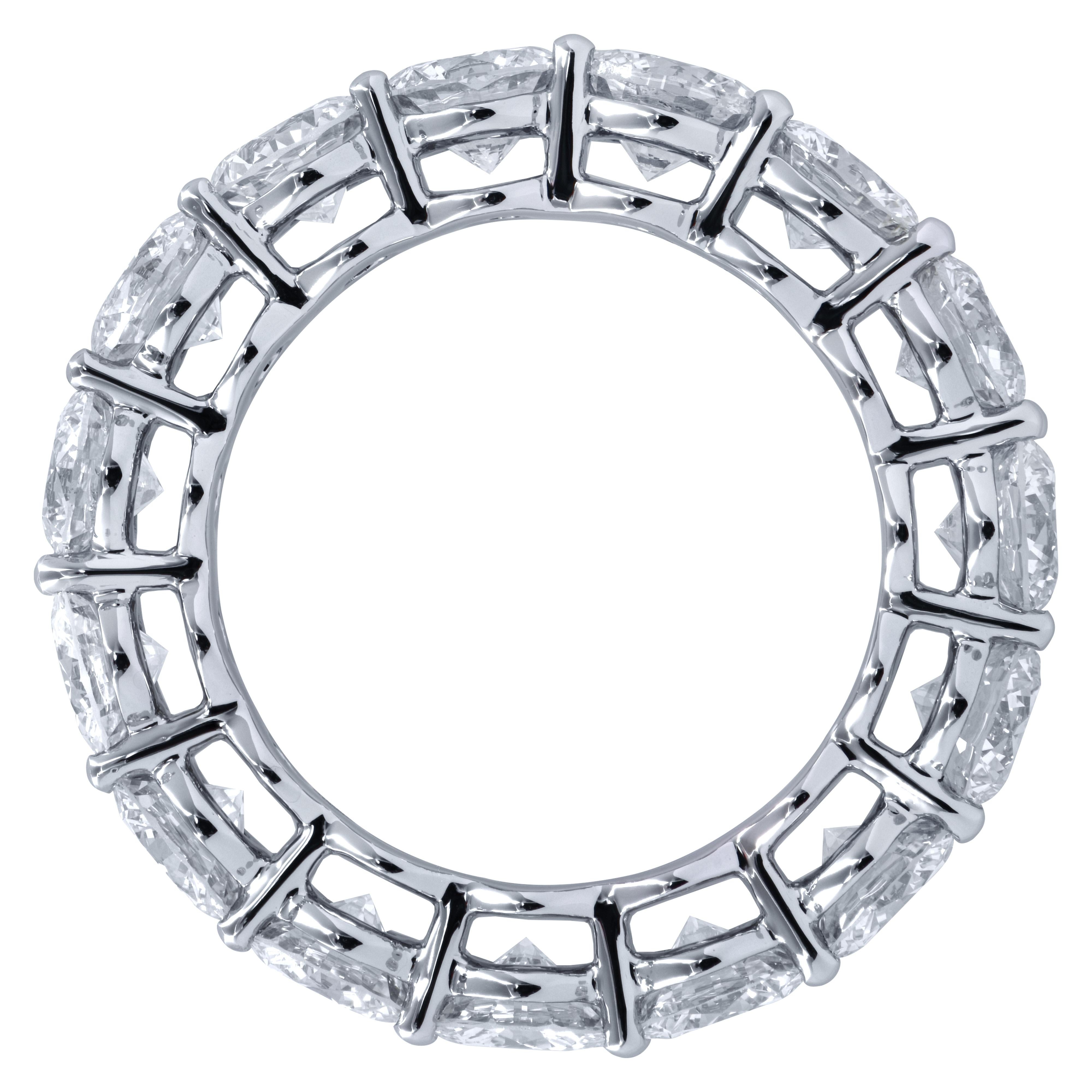 Exquisite eternity band crafted in Platinum, showcasing 15 stunning round brilliant cut diamonds weighing 5.80 carats total, G-J color, VS-SI clarity. Each diamond is carefully selected, perfectly matched and set in a seamless sea of eternity,
