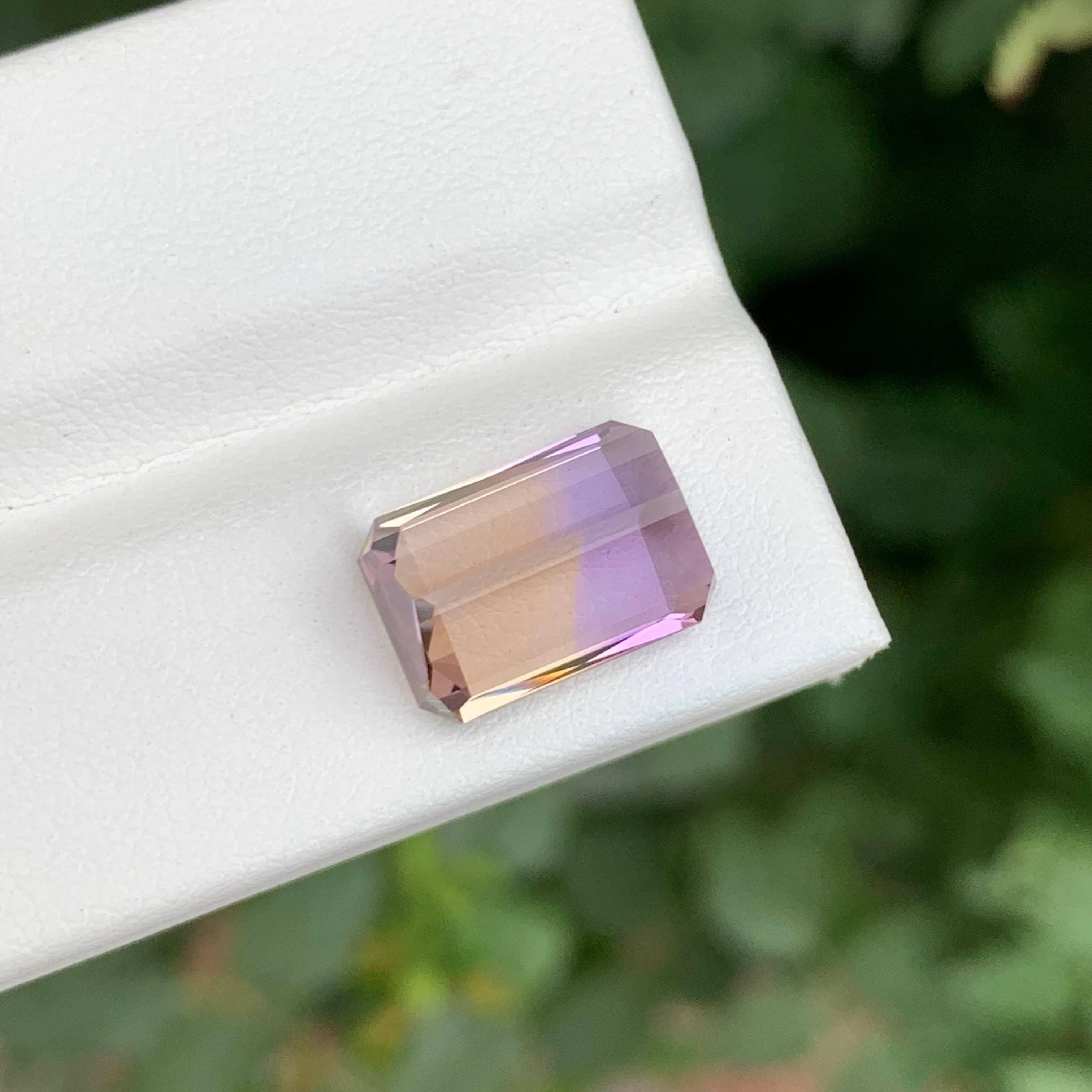 Weight 5.80 carat
Dimensions 12.6x8.7x7mm
Treatment None
Origin Bolivia
Clarity Loupe Clean
Shape Octagon
Cut Emerald 
NA


This 5.80-carat natural Ametrine gemstone is a captivating blend of amethyst and citrine, showcasing a stunning bi-color