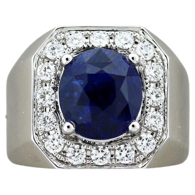 A beautiful oval-shaped sapphire weighing 5.80 carats takes center stage! It has a rich intense blue color which falls under the desirable “Royal Blue” category as seen on the certificate. It is complemented by 0.86 carats of round brilliant-cut