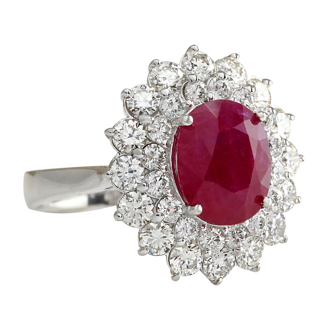 Introducing our captivating 5.80 Carat Ruby 14 Karat White Gold Diamond Ring. Crafted from stamped 14K White Gold, this ring has a total weight of 6.8 grams, ensuring both quality and durability. The focal point is a stunning ruby gemstone weighing