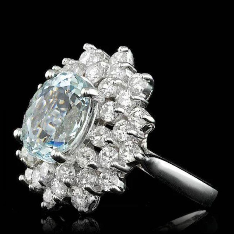 5.80 Carats Natural Aquamarine and Diamond 14K Solid White Gold Ring

Total Natural Aquamarine Weights: Approx. 3.50 Carats 

Aquamarine Measures: Approx. 11 x 9 mm 

Natural Round Diamonds Weight: Approx. 2.30 Carats (color G-H  / Clarity