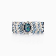 5.80 Ct Opal, 1.20 Ct Diamond, 1.40 Ct Sapphire and Pearl Bracelet in14K White G