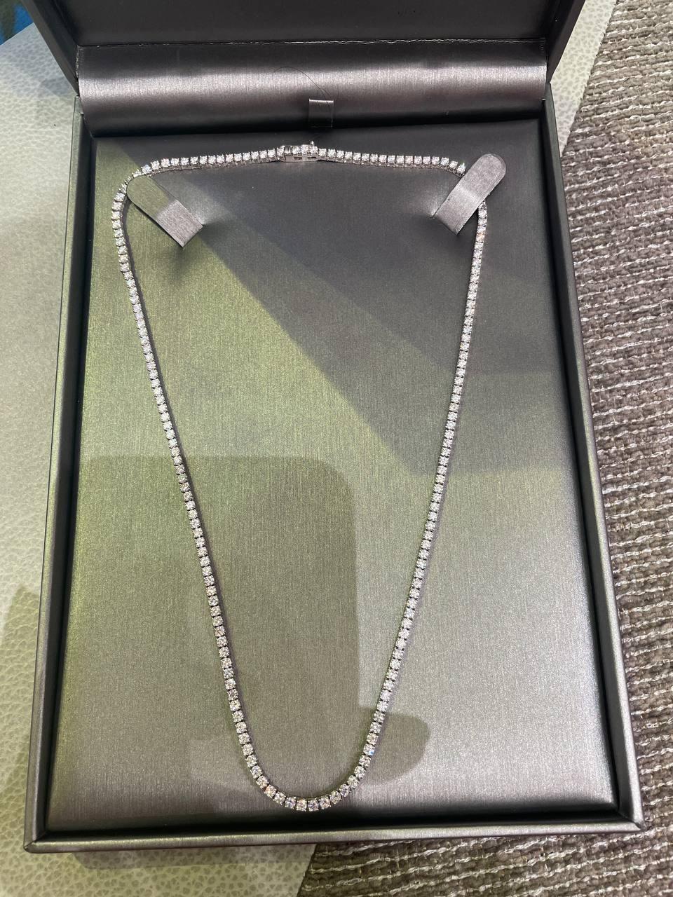 An Amazing Estate Diamond Handmade 14k White gold (stamped) Tennis Necklace with over 180 Round Brilliant Diamonds in G-H-I color, SI clarity over all. Estimated total weight of the diamonds is 7.60ctw. 
The length of the necklace is 18 inches;
