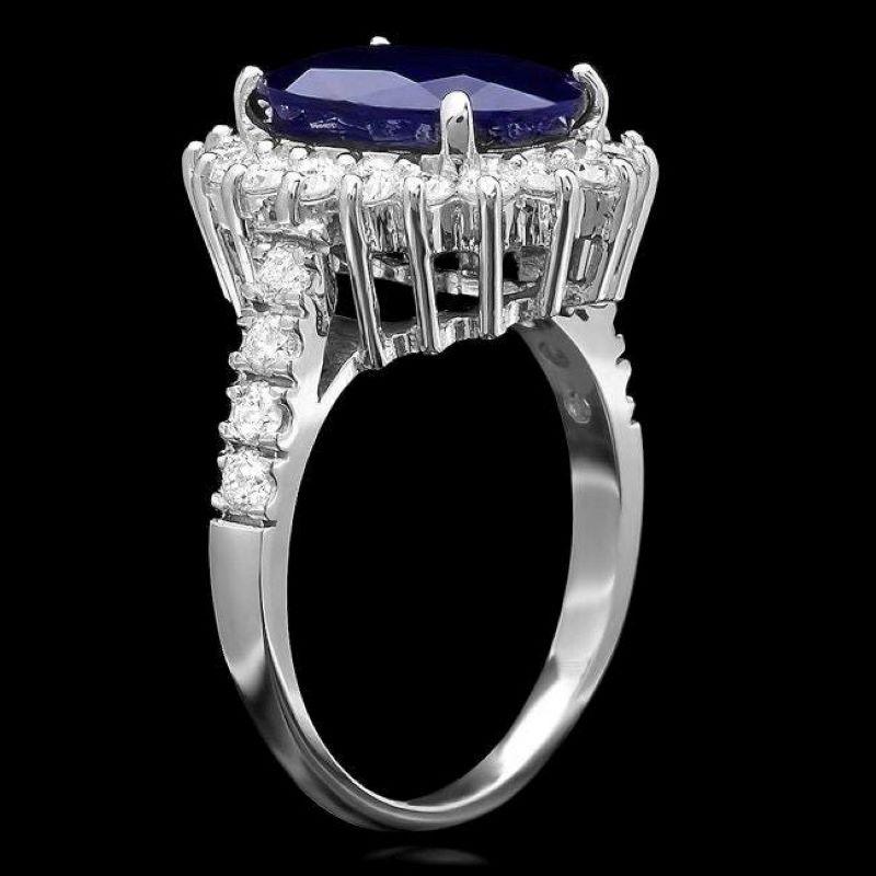 5.80 Carats Natural Blue Sapphire and Diamond 14K Solid White Gold Ring

Total Blue Sapphire Weight is: 4.90 Carats

Sapphire Measures: 11.00 x 9.00mm

Sapphire treatment: Diffusion

Natural Round Diamonds Weight: 0.90 Carats (color G-H / Clarity