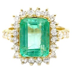 Bague en or jaune massif 18 carats avec émeraudes naturelles et diamants 5,80 carats