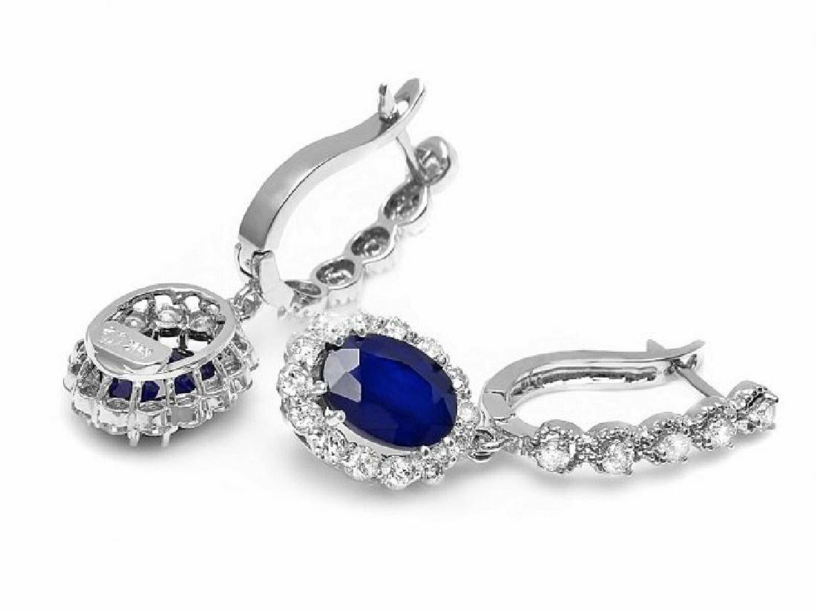 Exquisite 5.80 Carats Natural Sapphire and Diamond 14K Solid White Gold Earrings

Amazing looking piece!

Total Natural Round Cut White Diamonds Weight: Approx. 1.30 Carats (color G-H / Clarity SI1-SI2)

Total Natural Oval Cut Sapphires Weight: