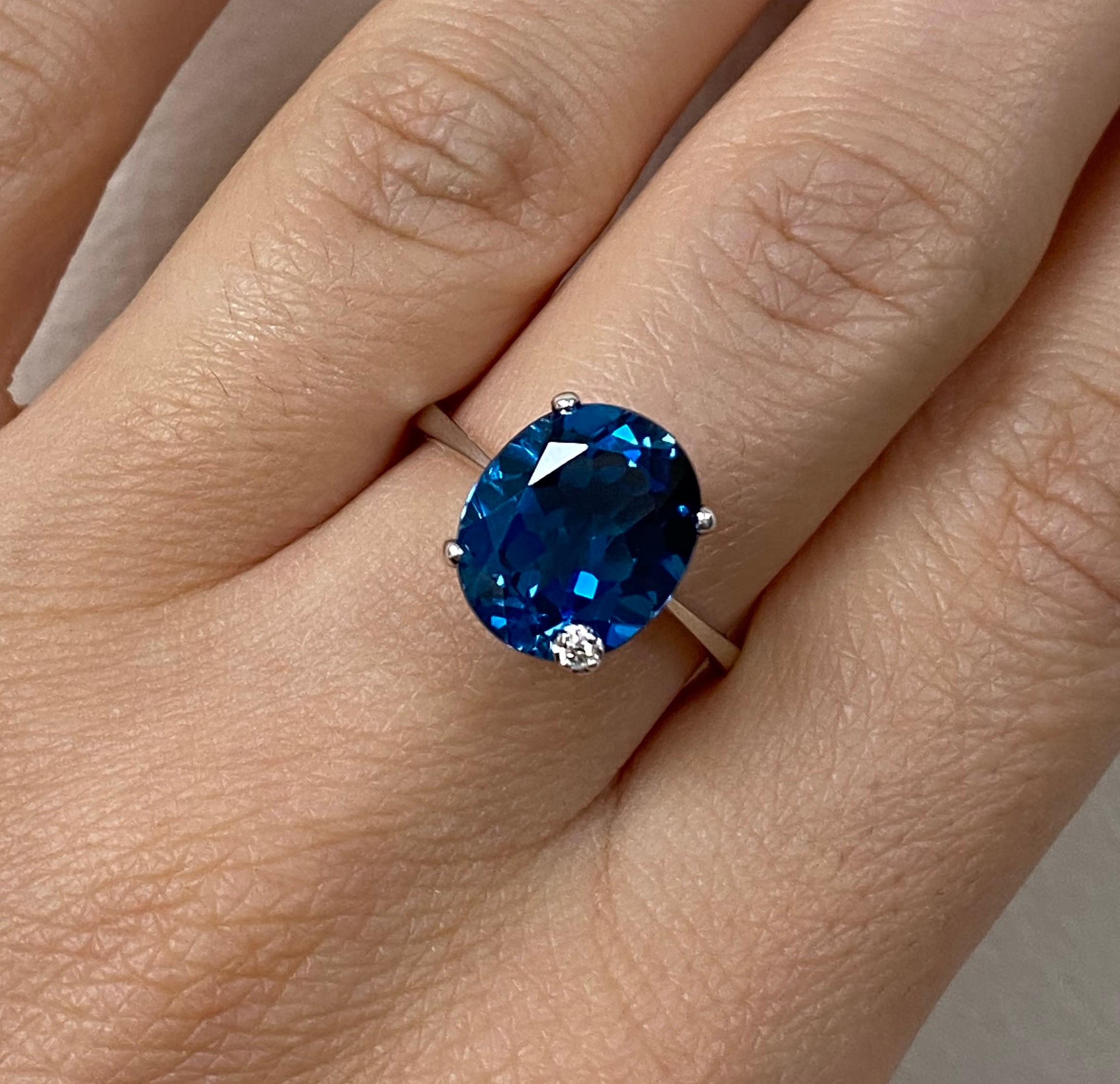 Contemporary 5.81 Carat Blue Topaz and Diamond Ring