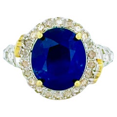 5.81 Carat Royal Blue Sapphire Ring with Rose Cut Diamonds in 18K Yellow Gold