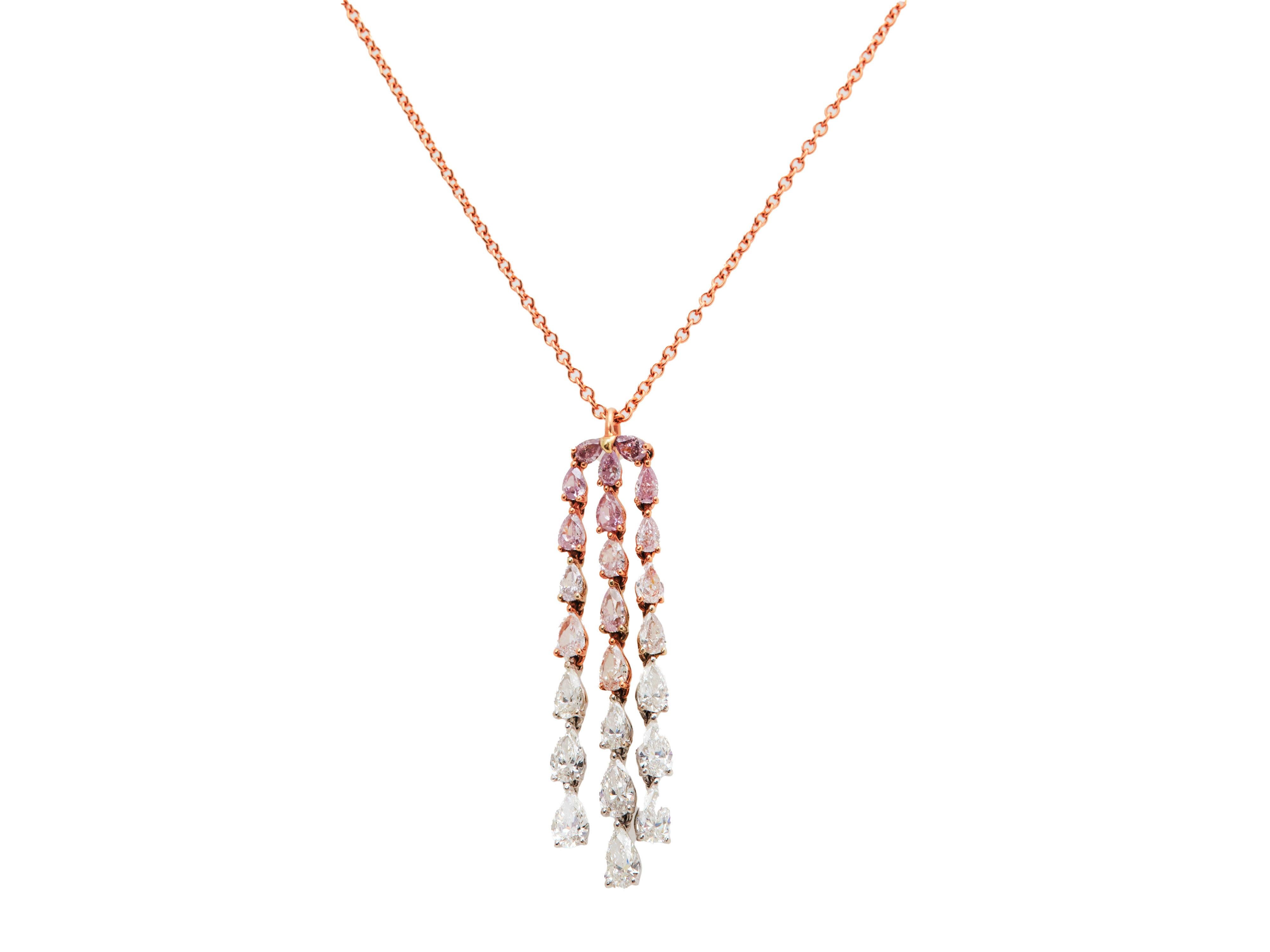 A gorgeous and unique necklace with beautiful movement. An impressive tassel made up of 34 pear-shaped pink and white diamonds VS clarities, mounted in a polished 18K Rose and white gold. hanging from a polished 18K rose gold chain.

This piece was