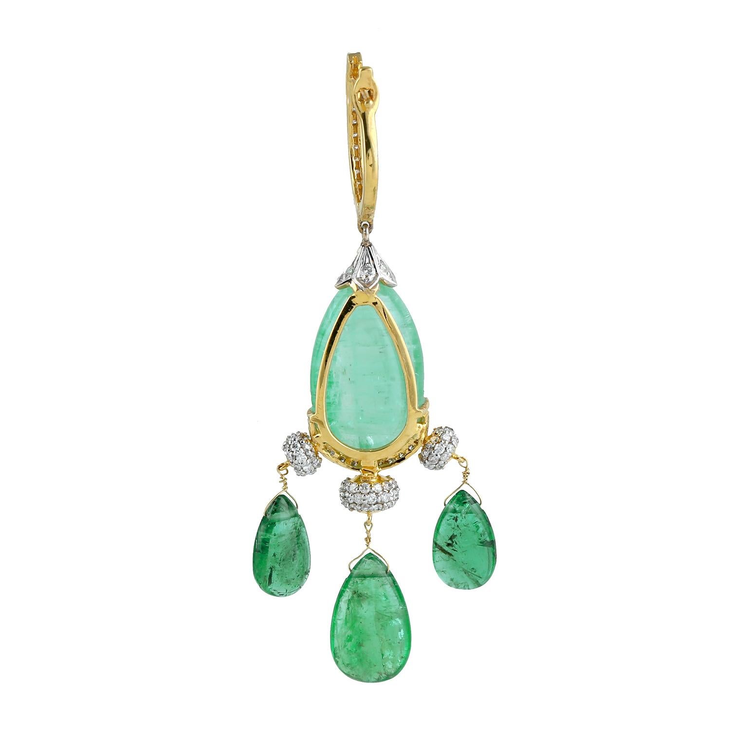 Cast from 18-karat gold.  These beautiful earrings are hand set with 58.18 carats emerald and 2.02 carats of sparkling diamonds.

FOLLOW  MEGHNA JEWELS storefront to view the latest collection & exclusive pieces.  Meghna Jewels is proudly rated as a