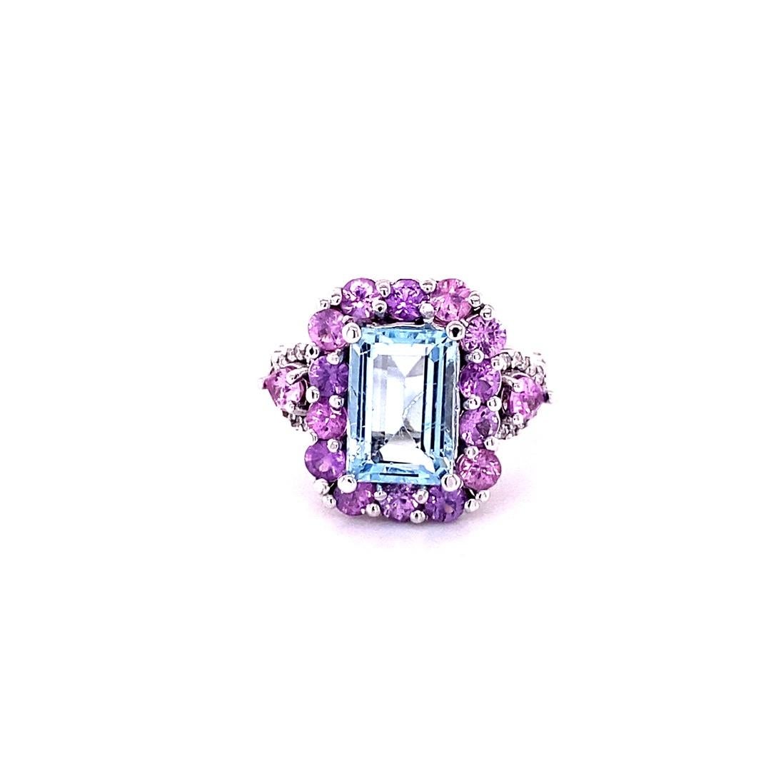 5.82 Carat Aquamarine Pink Sapphire Diamond White Gold Cocktail Ring

This ring has a gorgeous 3.14 Carat Emerald Cut Aquamarine and is surrounded by 20 Pink Sapphires that weigh 2.16 carats and 2 Pear Cut Pink Sapphires that weigh 0.39 carats. It