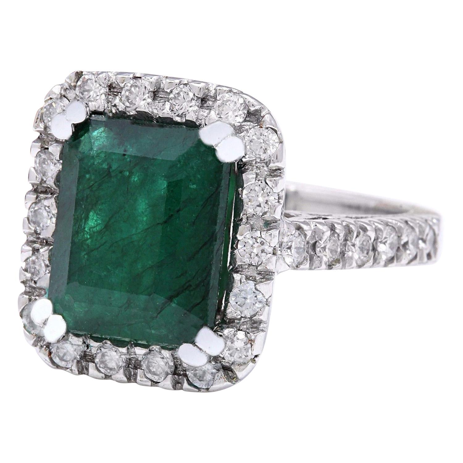 Presenting our exquisite 14K Solid White Gold Diamond Ring adorned with a captivating 5.82 Carat Natural Emerald centerpiece. Meticulously crafted with precision and elegance, this ring epitomizes sophistication and luxury. The stunning emerald