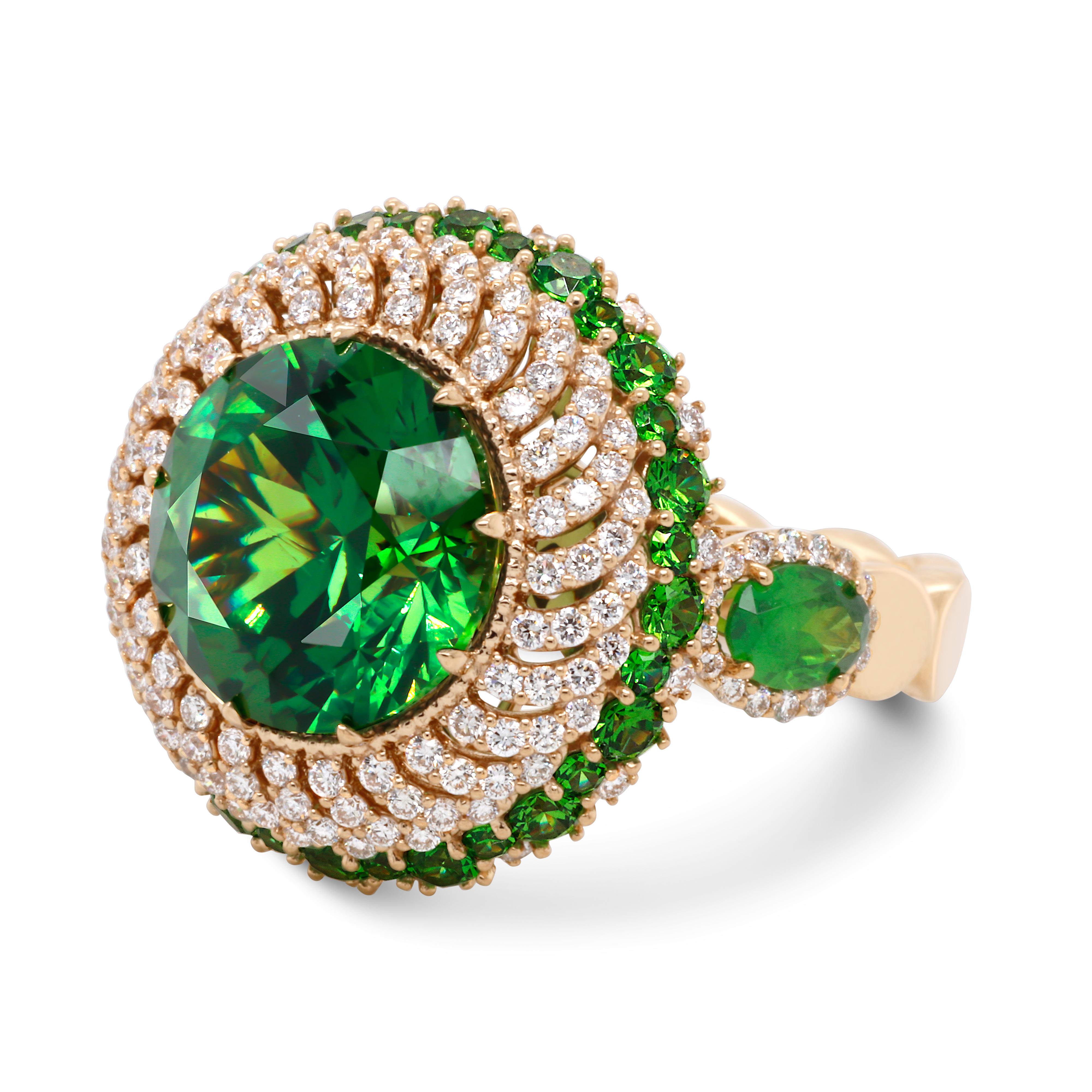 18 Karat Gold Ring featuring rare world-class 5.82 ct Russian Demantoid which is complimented with round brilliant-cut Demantoids 0.8ctw, sparkling colorless Diamonds 0.64 ctw and two oval cut 0.57ctw Russian Demantoids. 
Demantoid is the rarest