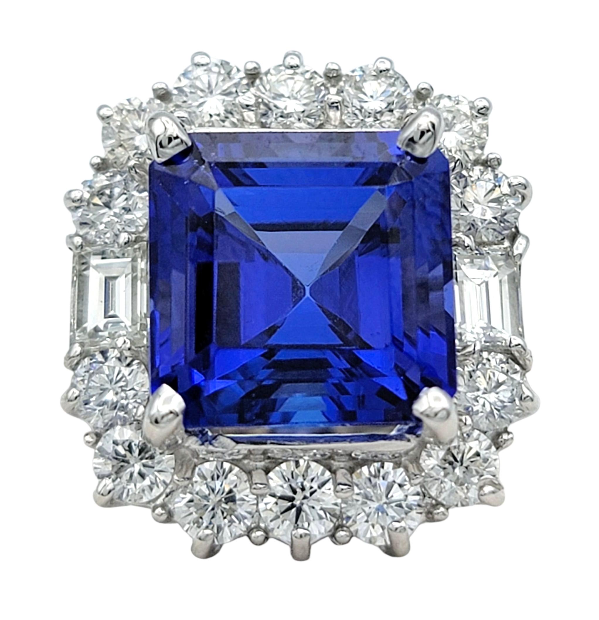Misura dell'anello: 6

Questo straordinario anello è incentrato su una vivida tanzanite quadrata dal taglio a smeraldo di 5,82 carati, che irradia un'ipnotica tonalità blu-violetta. La ricca profondità di colore della gemma è accentuata da