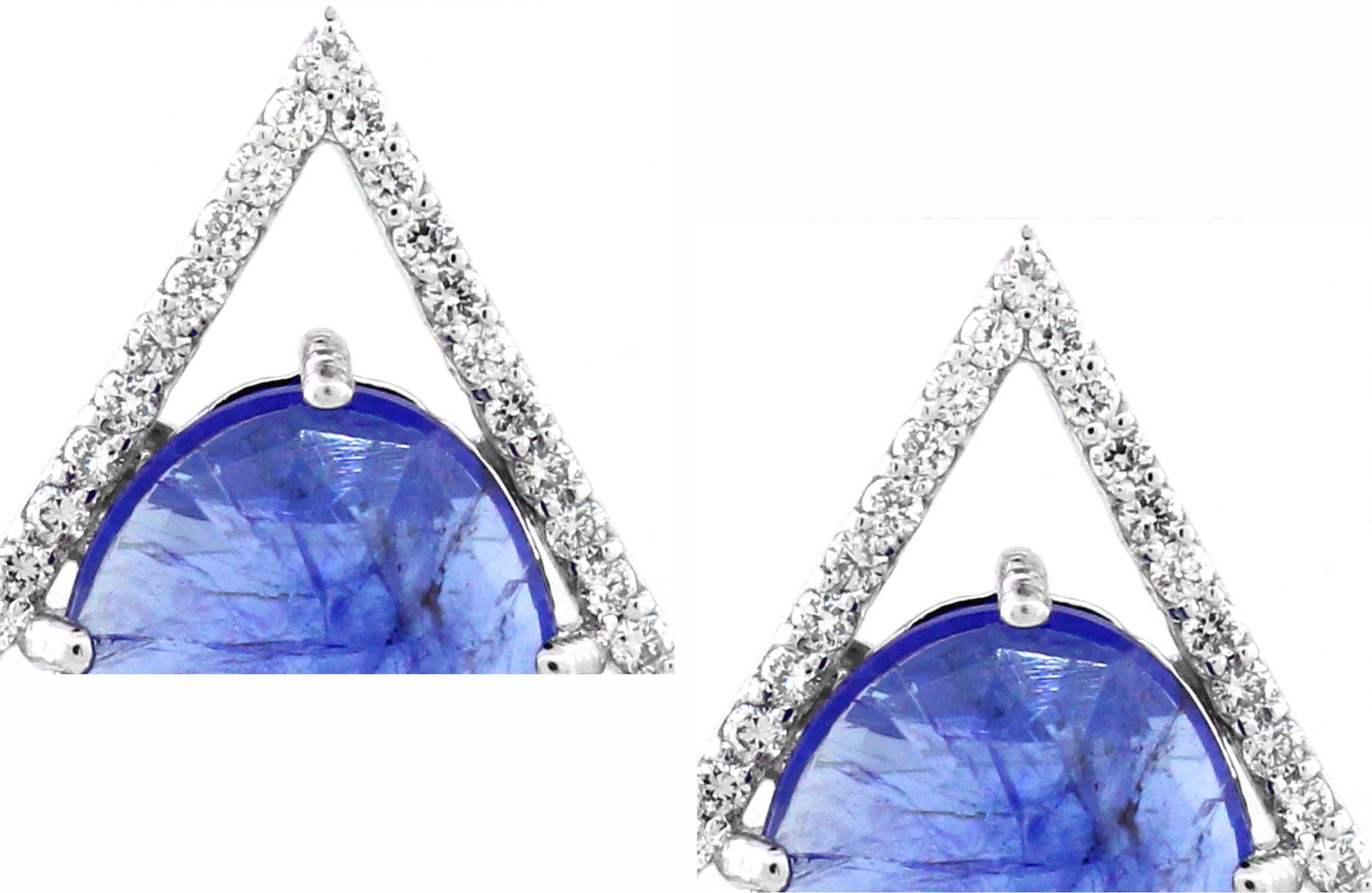 Introducing our stunning Triangle Tanzanite Stud Earrings, a modern and elegant addition to your jewelry collection. Crafted with precision in luxurious 18K white gold, weighing 7.10 grams, these earrings feature a chic triangle shape that exudes