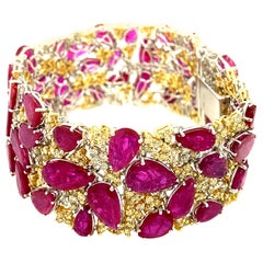 58.24 Carat Pear-Shaped Ruby and Yellow Diamond Gold Bracelet