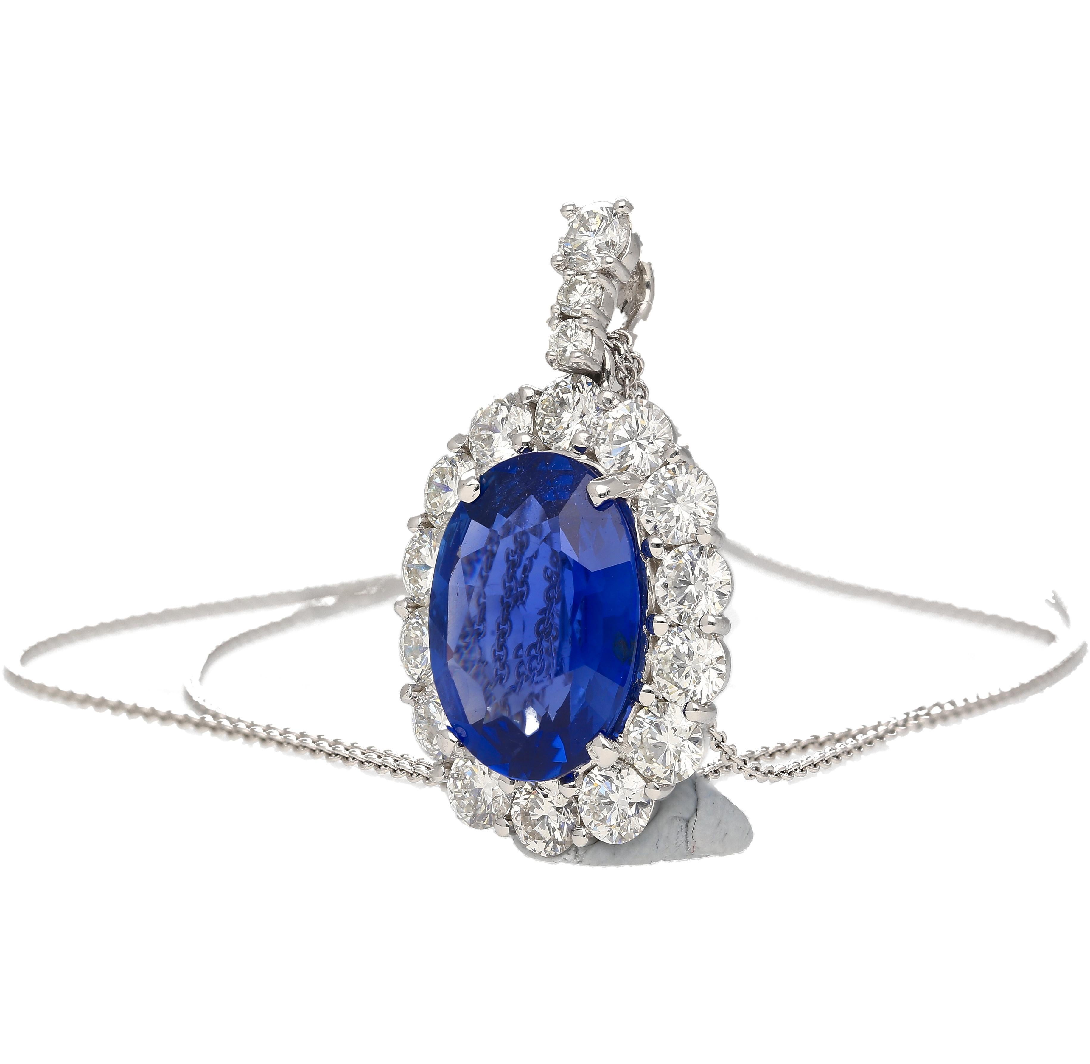 5.83 Carat Oval Cut Sri Lanka Blue Sapphire & Diamond Halo Pendant in Platinum 900. 

This eye-catching necklace features a GRS-certified, oval-cut natural blue sapphire and is secured with a 4-prong setting. The sapphire has no treatment or heat