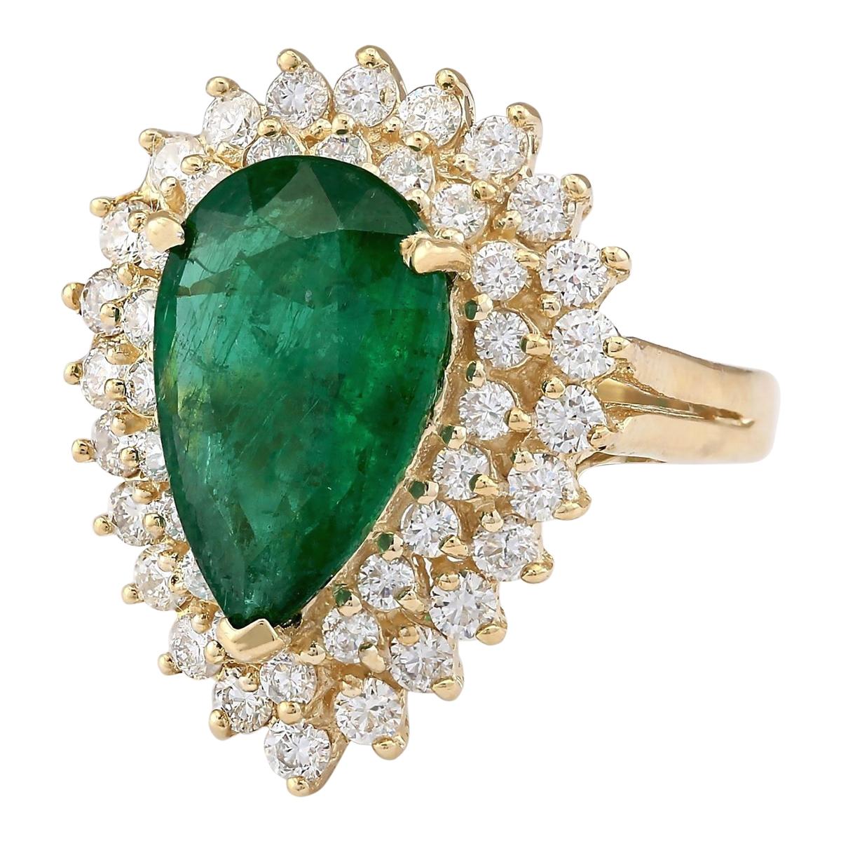 Introducing our exquisite 5.84 Carat Emerald 14 Karat Yellow Gold Diamond Ring. Crafted from stamped 14K Yellow Gold, this ring boasts a weight of 7.0 grams, ensuring both quality and durability. The focal point is a stunning emerald gemstone