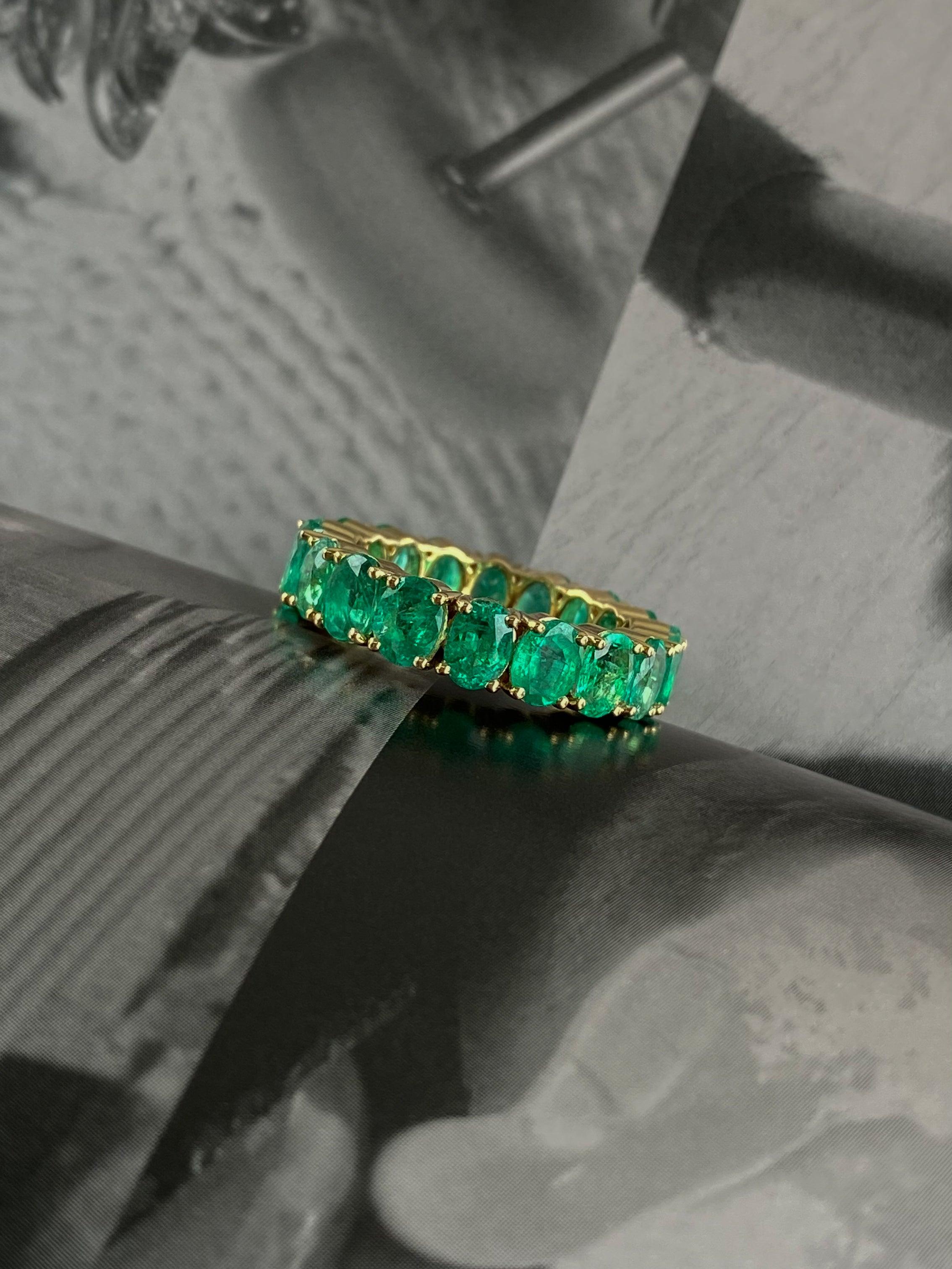 For Sale:  5.84 Carat Oval Cut Emerald Eternity Band in 18 Karat Yellow Gold 7