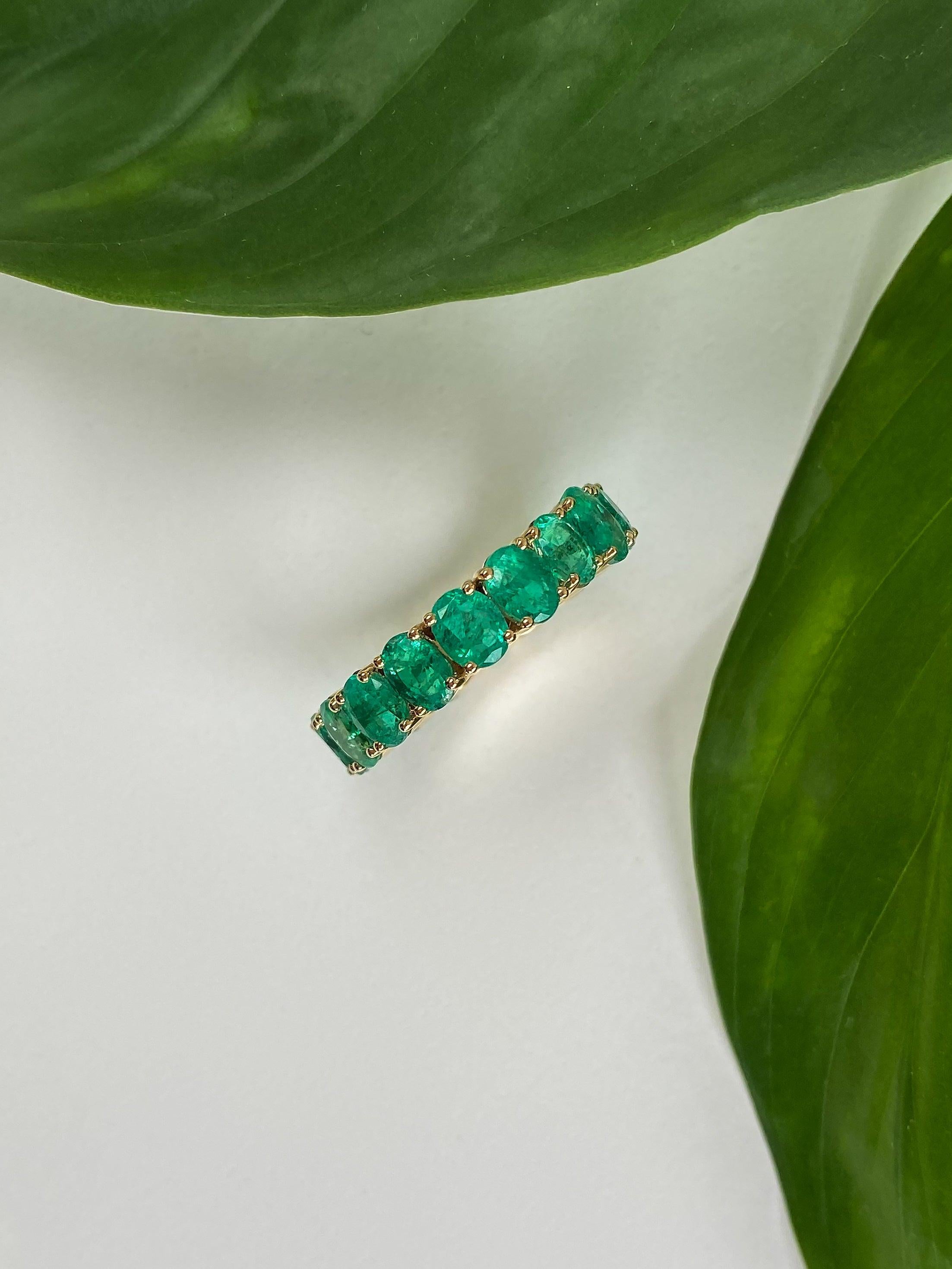 For Sale:  5.84 Carat Oval Cut Emerald Eternity Band in 18 Karat Yellow Gold 9
