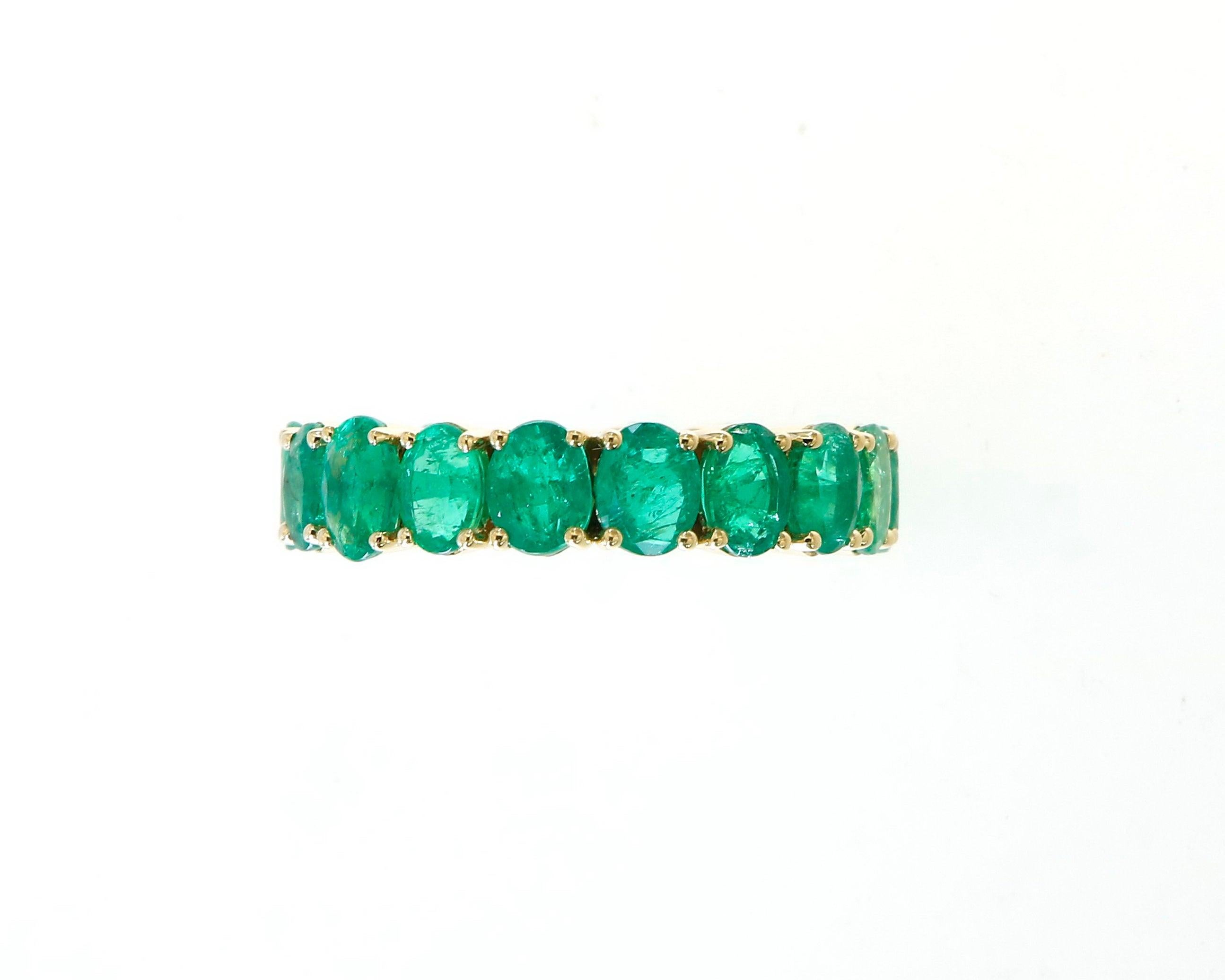For Sale:  5.84 Carat Oval Cut Emerald Eternity Band in 18 Karat Yellow Gold 2