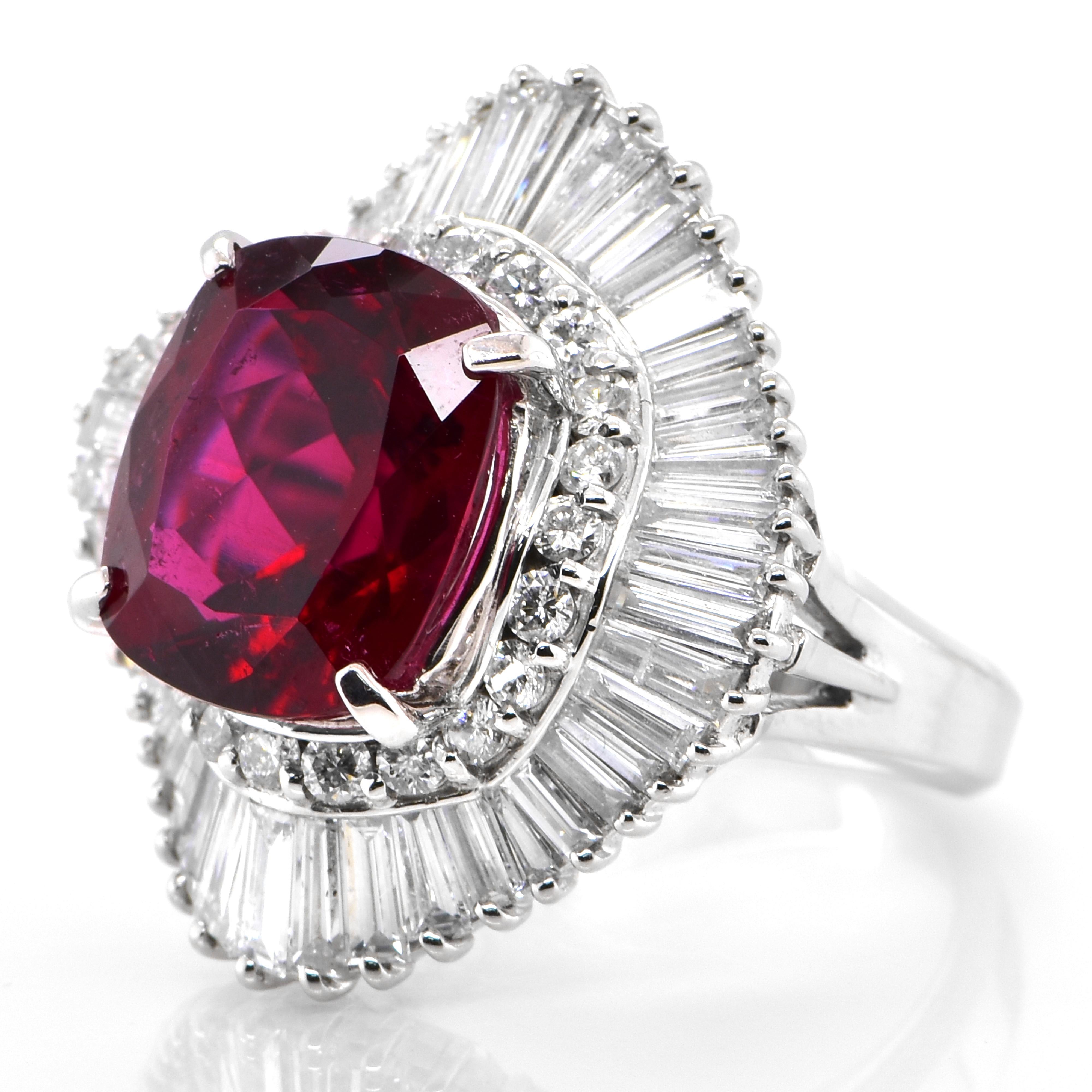 A stunning Cocktail Ring featuring 5.85 Carats of Natural Rubellite Tourmaline and 2.21 Carats of Diamond Accents set in Platinum. Tourmalines were first discovered by Spanish conquistadors in Brazil in 1500s. The name Tourmaline comes from