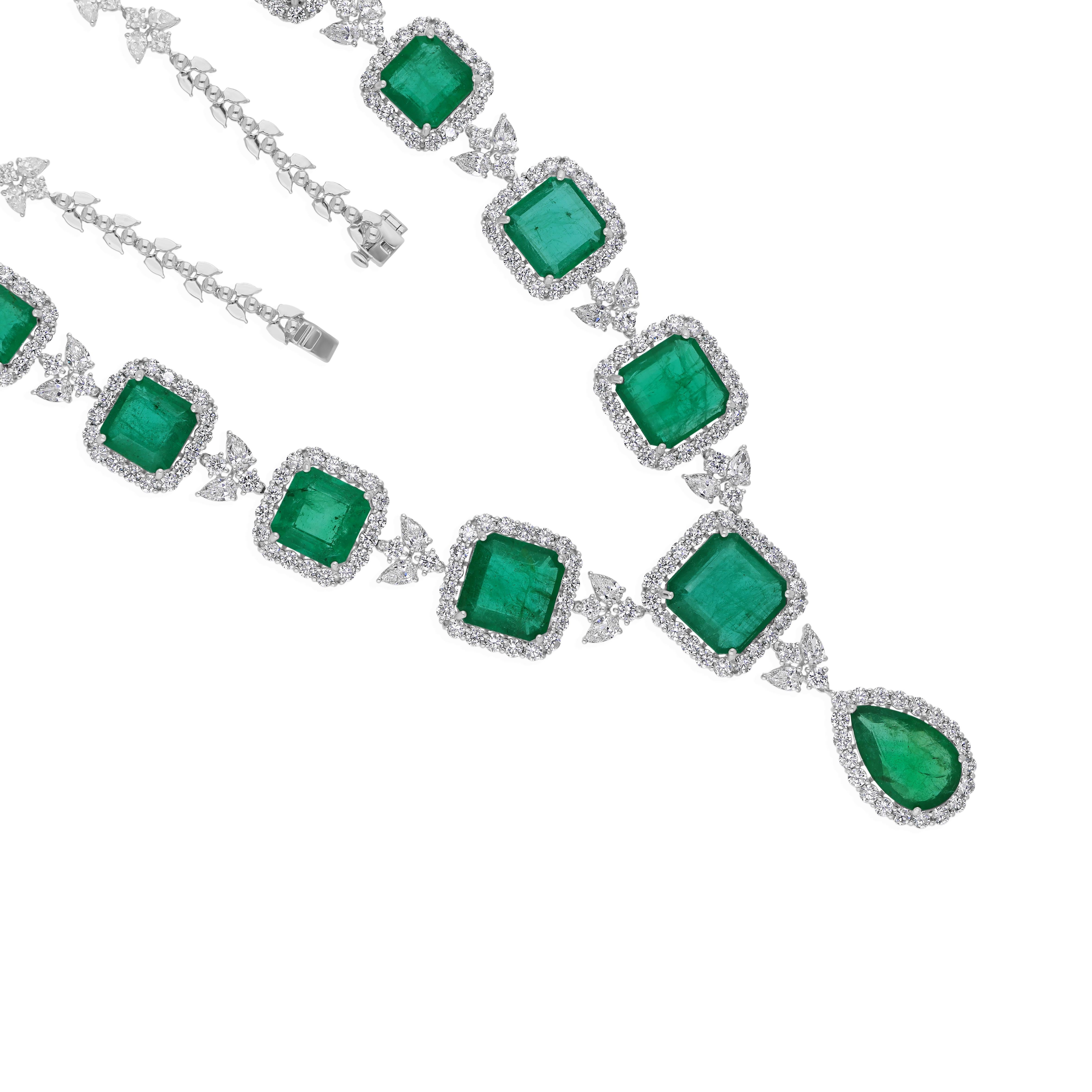 Cast from 14-karat gold, these exquisite necklace is handset with 58.5 Carat Zambian emerald and 20.33 carats of sparkling diamonds.

FOLLOW SPECTRUM JEWELS storefront to view the latest collection & exclusive pieces. Spectrum Jewels is proudly