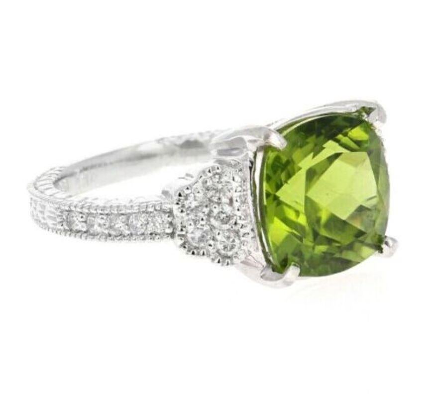 5.85 Carats Natural Very Nice Looking Peridot and Diamond 14K Solid White Gold Ring

Total Natural Square Cushion Peridot Weight is: Approx. 5.50 Carats

Natural Round Diamonds Weight: Approx. 0.35 Carats (color G-H / Clarity SI1-SI2)

Ring size: 6