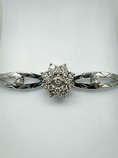 585 oro bianco; bracciale con diamanti