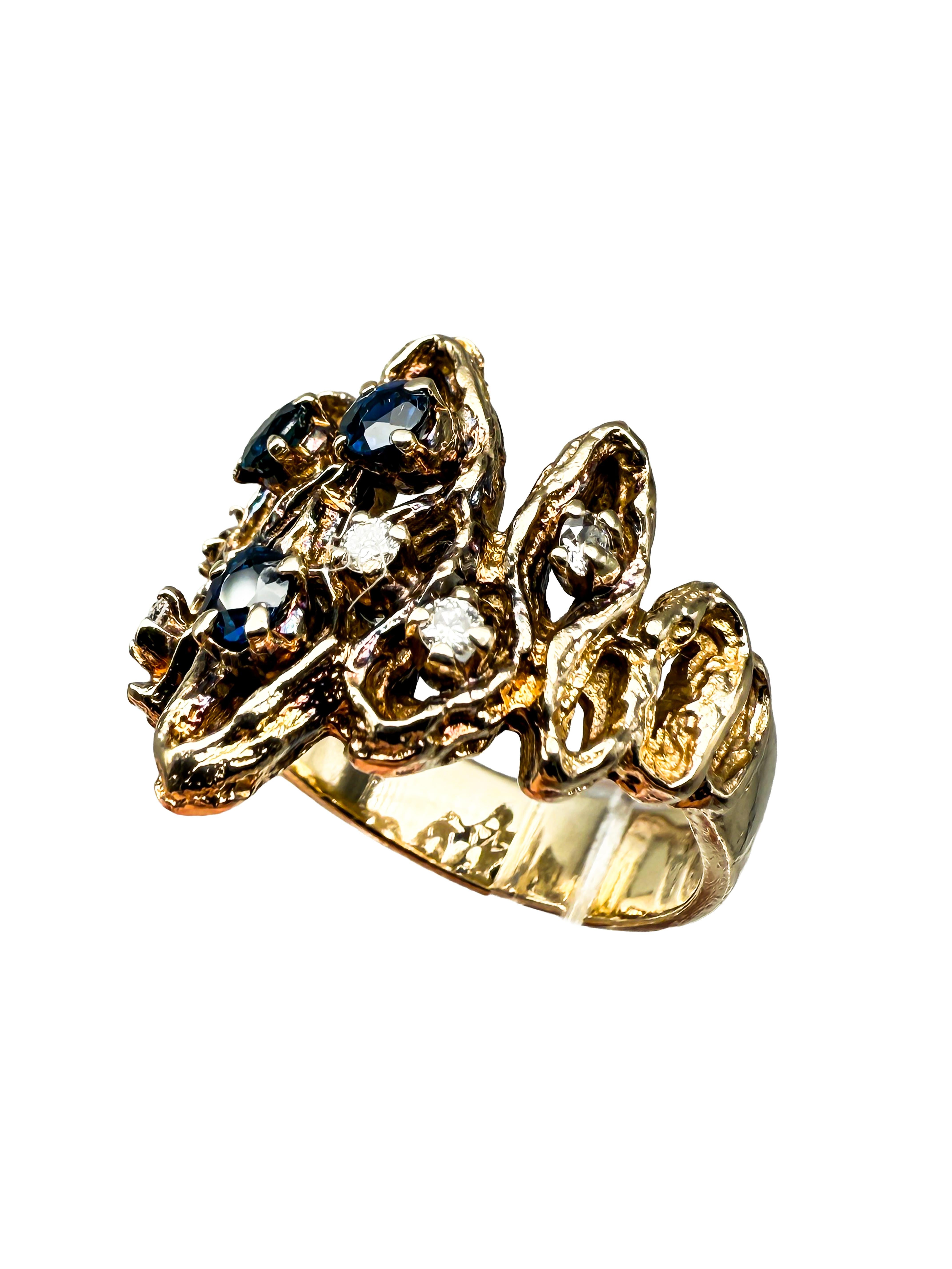 This elegant ring, crafted from high-quality 14-karat yellow gold, combines timeless beauty with an impressive composition of gemstones. Thanks to its very good pre-owned condition, it shows only minimal signs of wear, as visible in the photos — a
