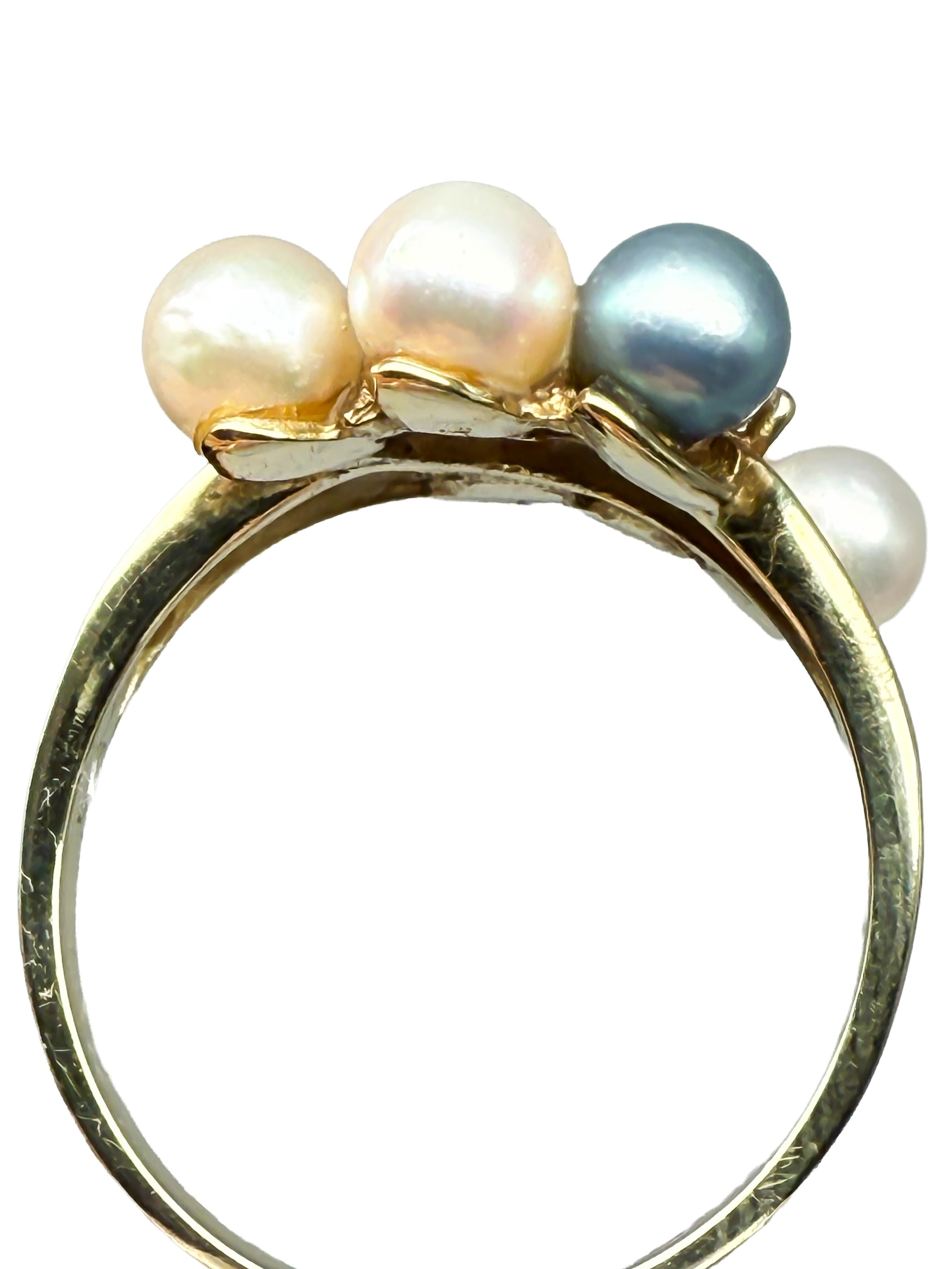 Cette élégante bague en or jaune 14 carats allie beauté classique et sophistication intemporelle. Au centre du design se trouve une perle naturelle non traitée de 4,5 mm de diamètre, dont l'éclat fin et la douce teinte blanche apportent une touche