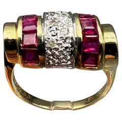 585 yellow gold ring with rubies and diamonds; certificate included