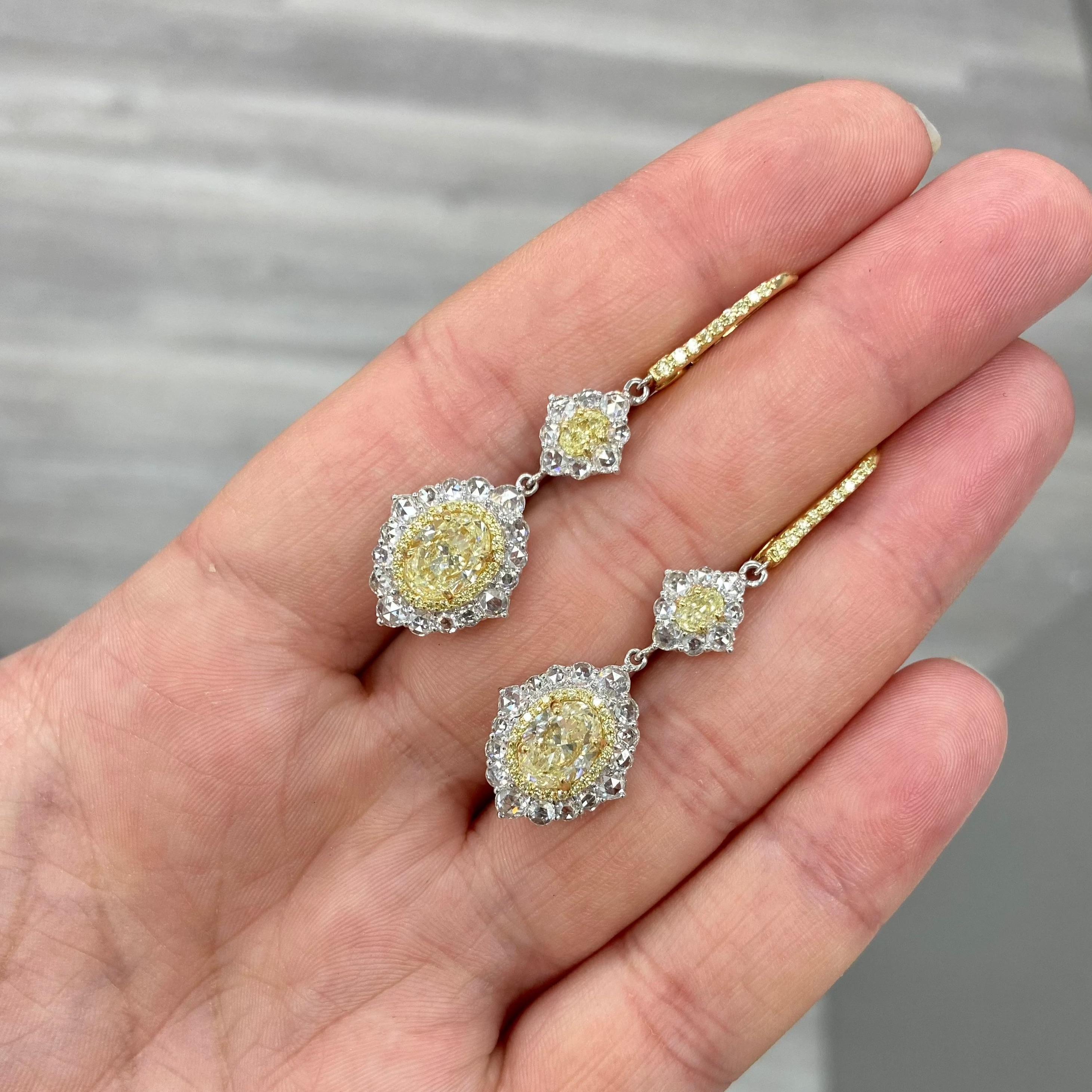5.85ct total weight
1.50ct + 1.51ct GIA Light Yellow Oval Diamonds
SI1 and VVS2 clarity
0.50ct Light Yellow Oval Diamonds
2.34 Rose Cut & Surrounding Diamonds
Set in 18k Yellow Gold
Handmade in NYC

At Rare Colors, you can experience the elegance of