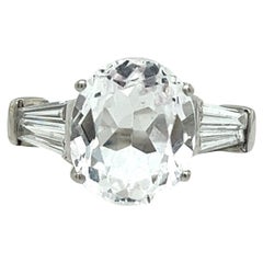 5.85ct Oval Faceted White Topaz Ring with Tapered Baguettes in 18ct White Gold