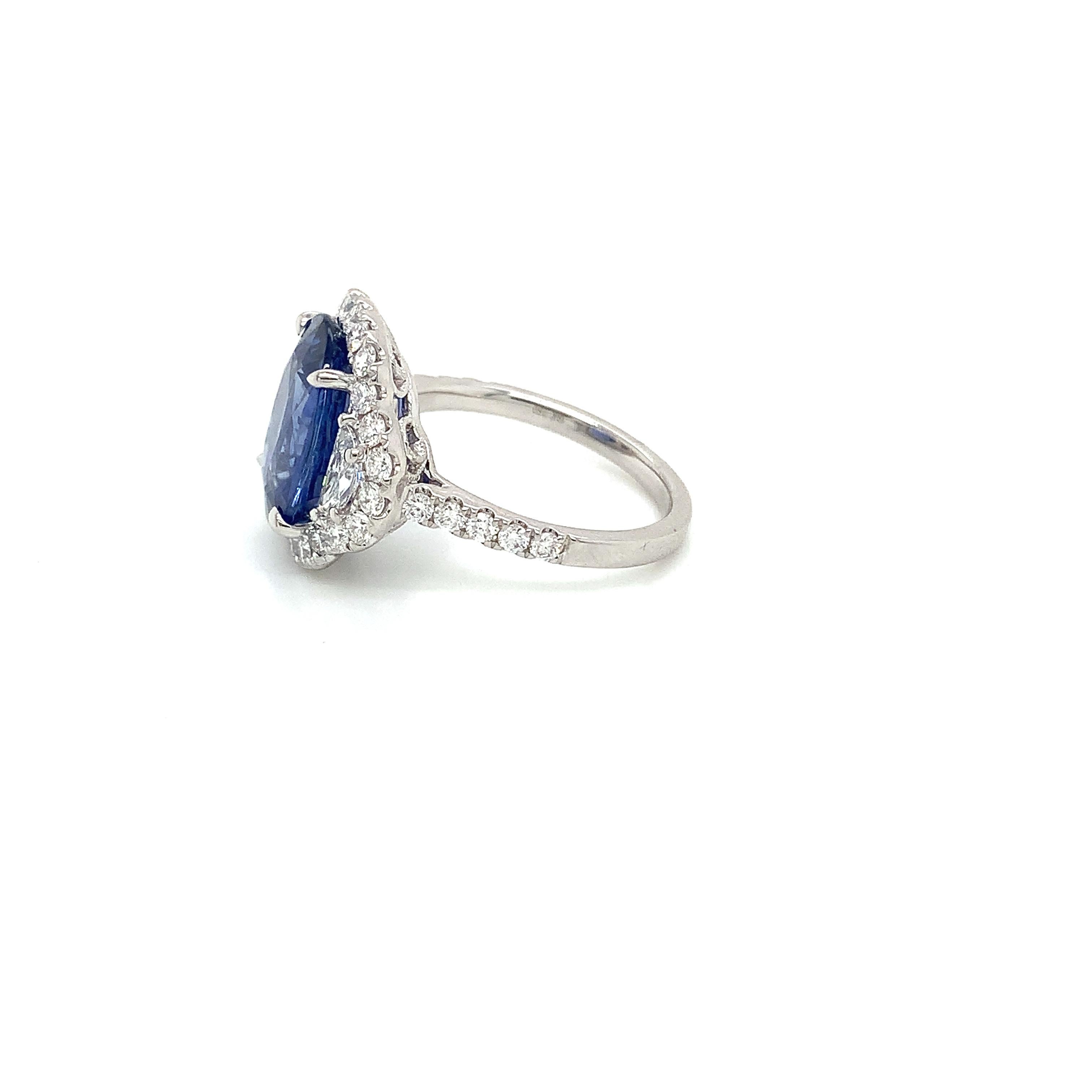 Oval Cut 5.86 Carat Blue Sapphire & Diamond Ring in 18 Karat White Gold For Sale