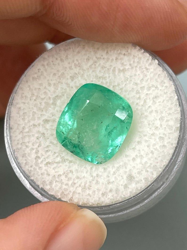 Women's 5.86 Carat Earthy Pastel Green Colombian Emerald - Cushion Cut May Birthstone For Sale