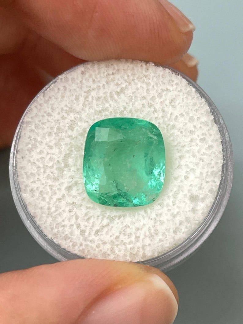 Modern 5.86 Carat Earthy Pastel Green Colombian Emerald - Cushion Cut May Birthstone For Sale