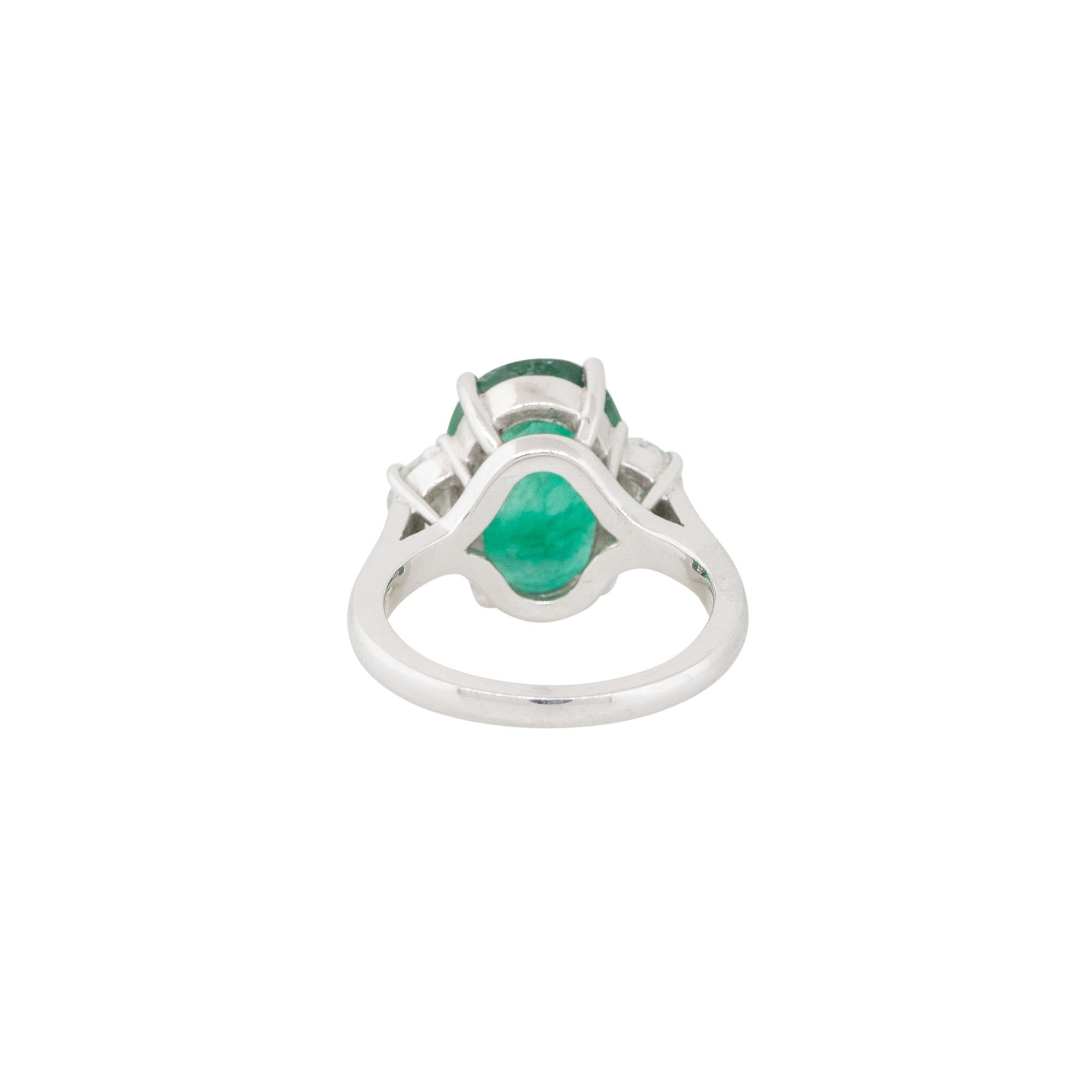 Oval Cut 5.86 Carat Emerald and Half Moon Diamond Side Stones Ring Platinum In Stock For Sale