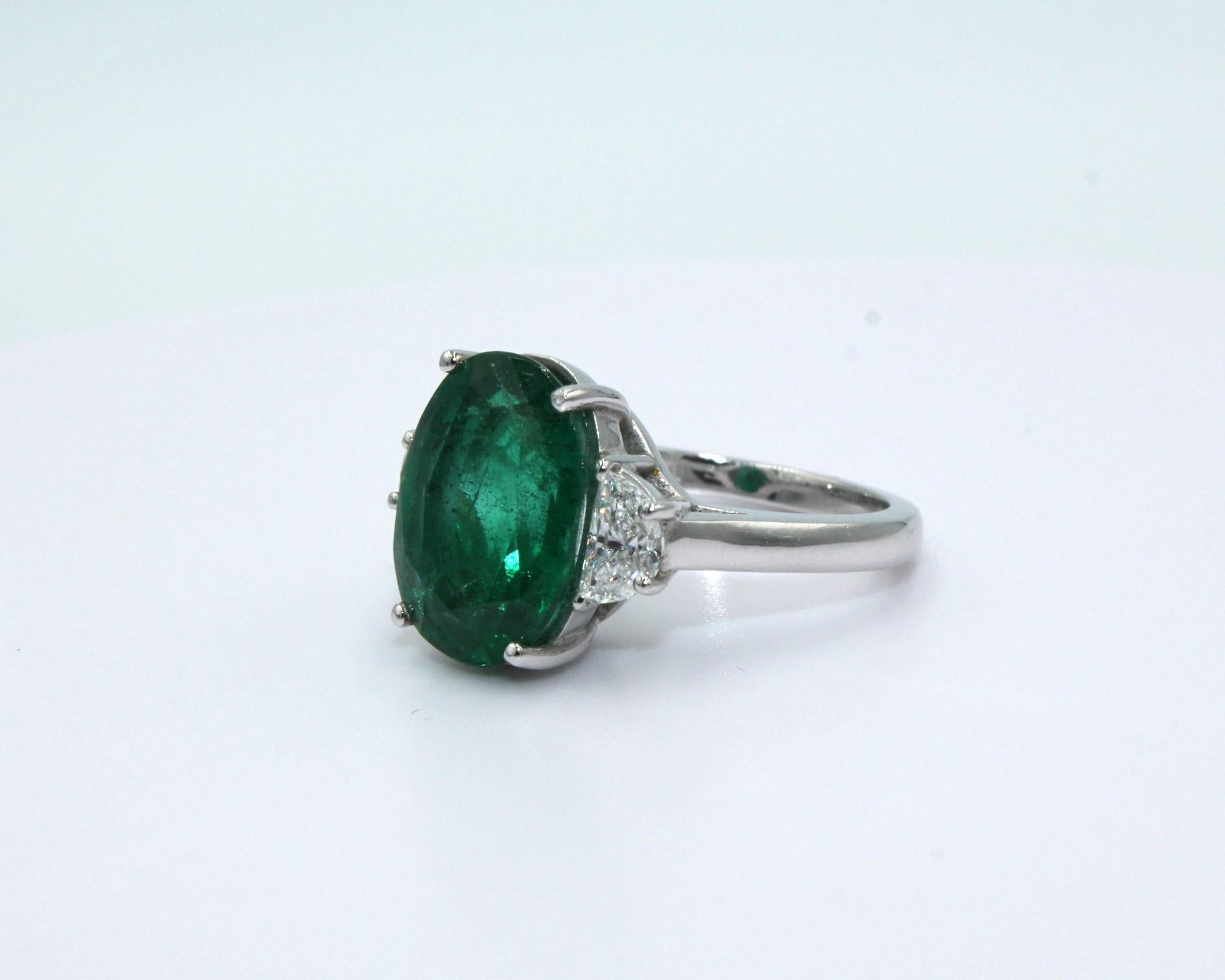 Oval Cut 5.86 Carat Emerald Diamond Ring For Sale