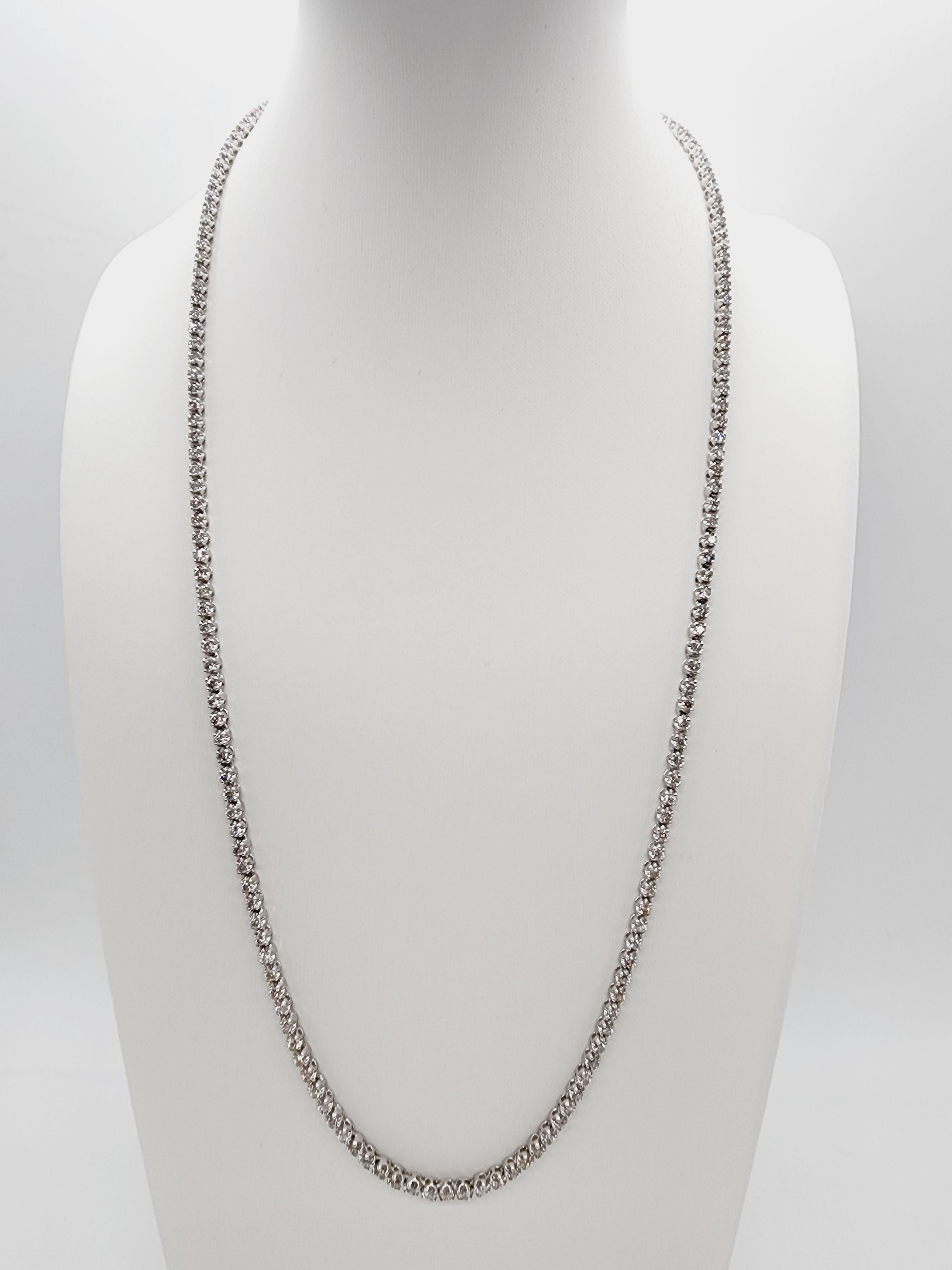 Brilliant and beautiful buttercup necklace, natural round-brilliant cut white diamonds clean and excellent shine. 14k white gold buttercup setting. 22 inch length. Average H Color, SI Clarity.  2.9 mm wide.

*Free shipping within the U.S.*