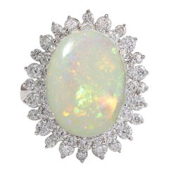 Bague en or blanc 14 carats avec opale et diamant