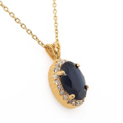 5.86 Carat Oval Sapphire and Diamond Pendant