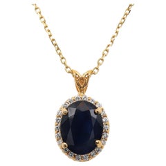 5.86 Carat Oval Sapphire and Diamond Pendant