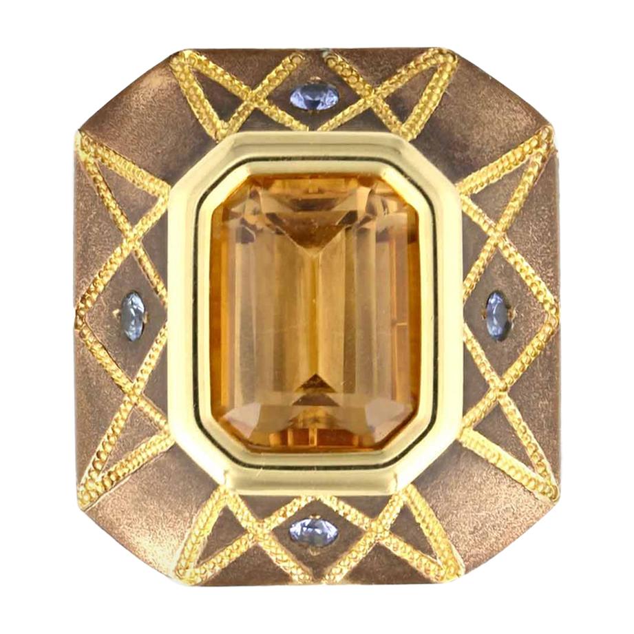 5.86 Carat Precious Topaz Ring in Bronze with Blue Sapphires For Sale