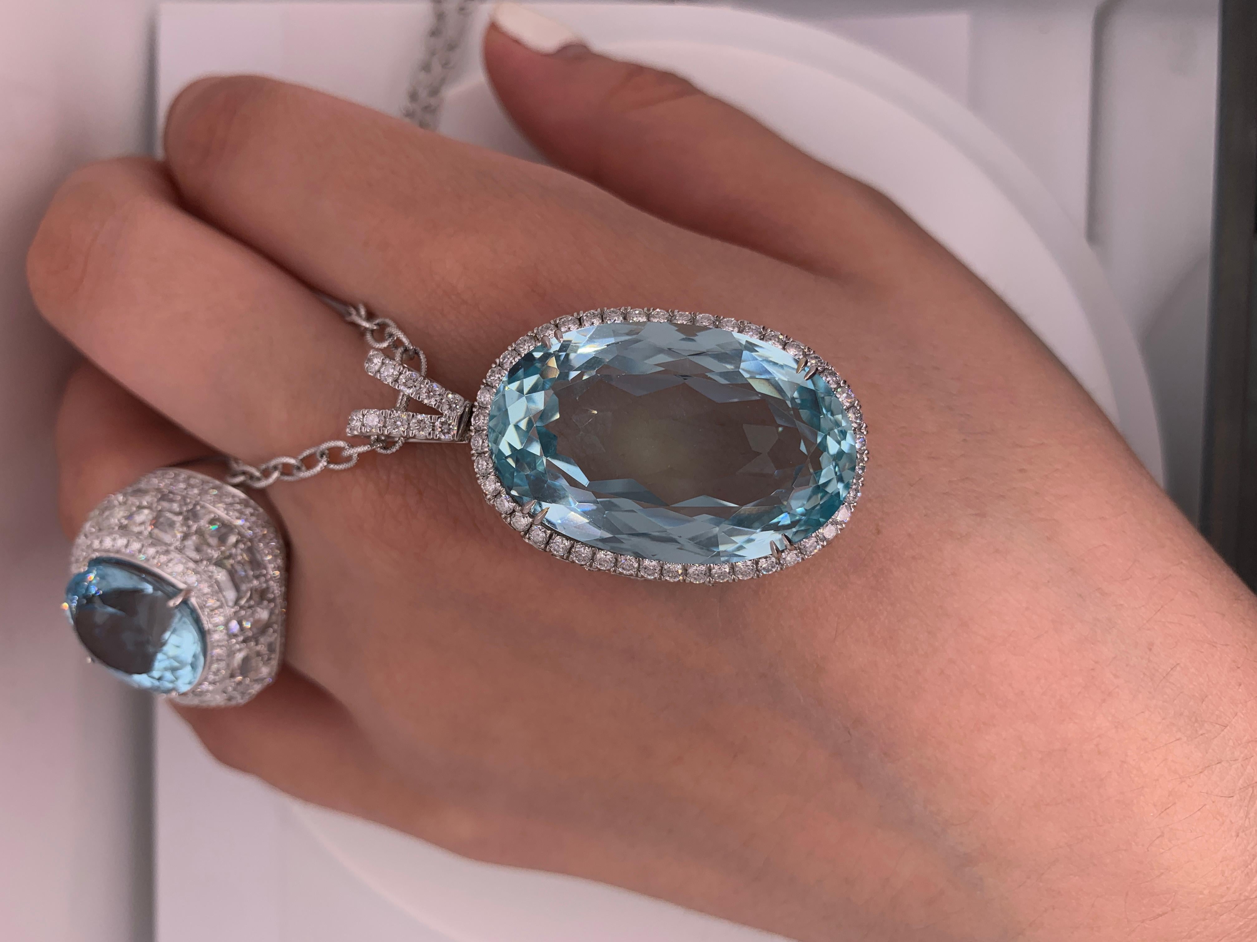 Oval Cut 58.67 Carat Aquamarine Diamond Pendant For Sale